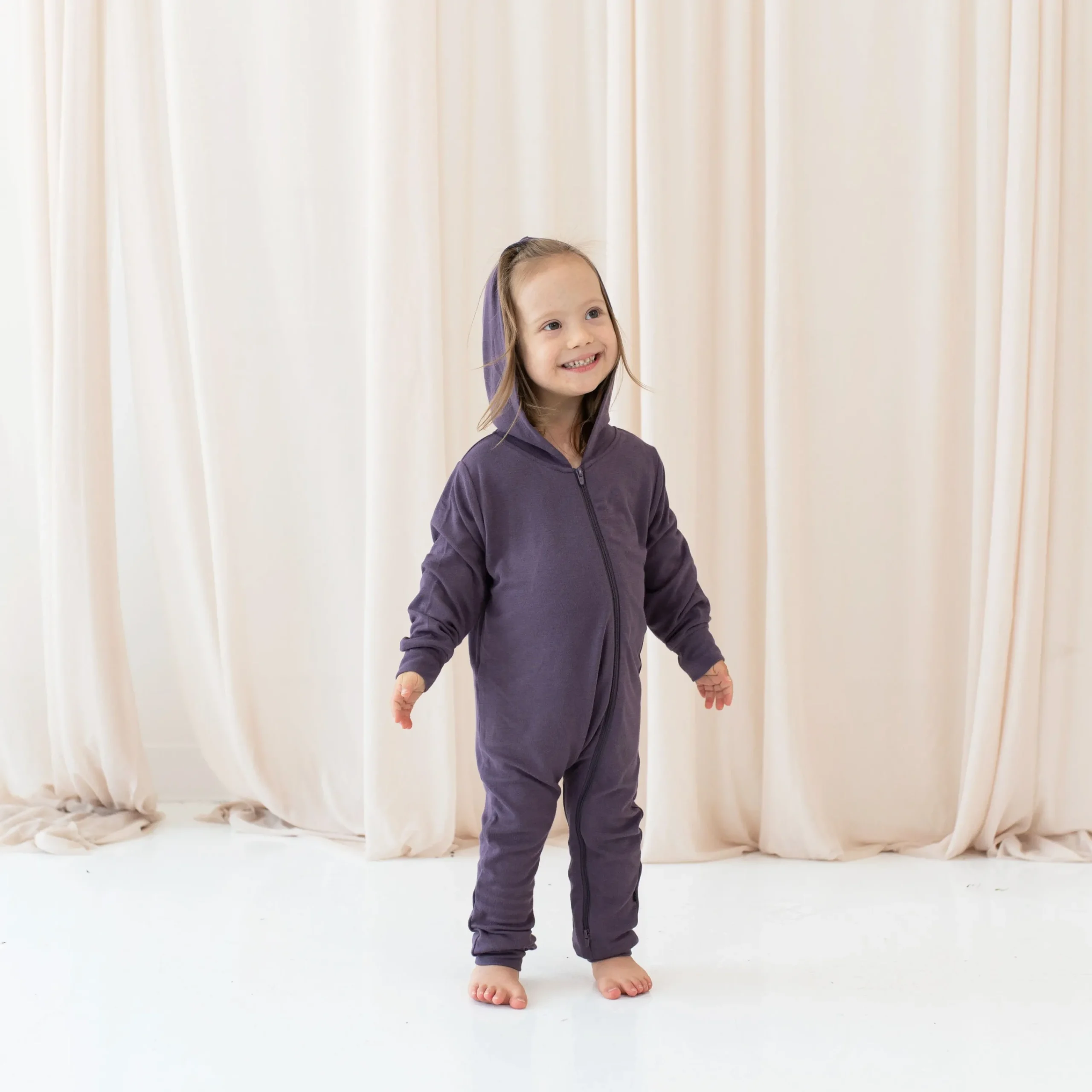 Kyte Baby Bamboo Jersey Hooded Zippered Romper in Currant New