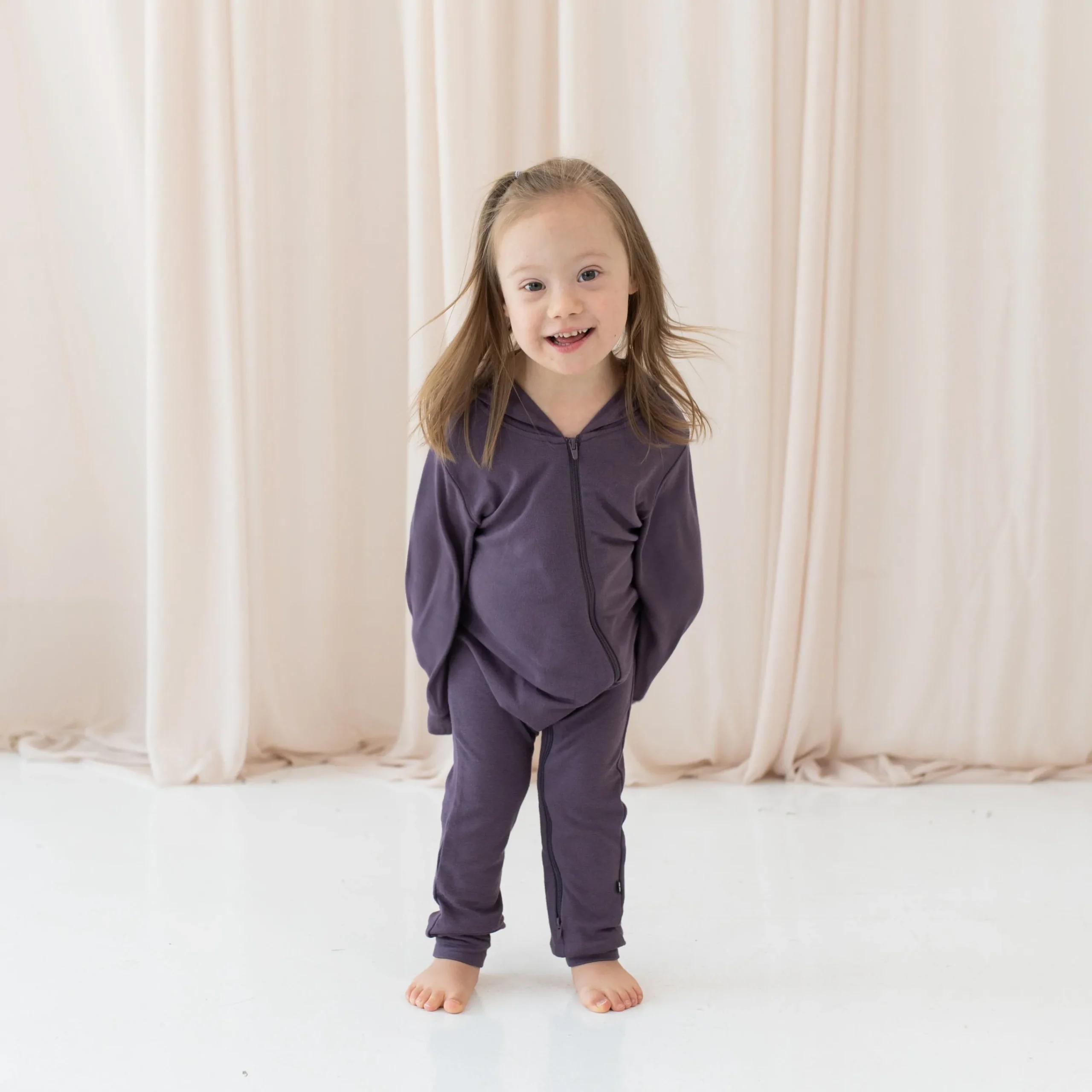 Kyte Baby Bamboo Jersey Hooded Zippered Romper in Currant New