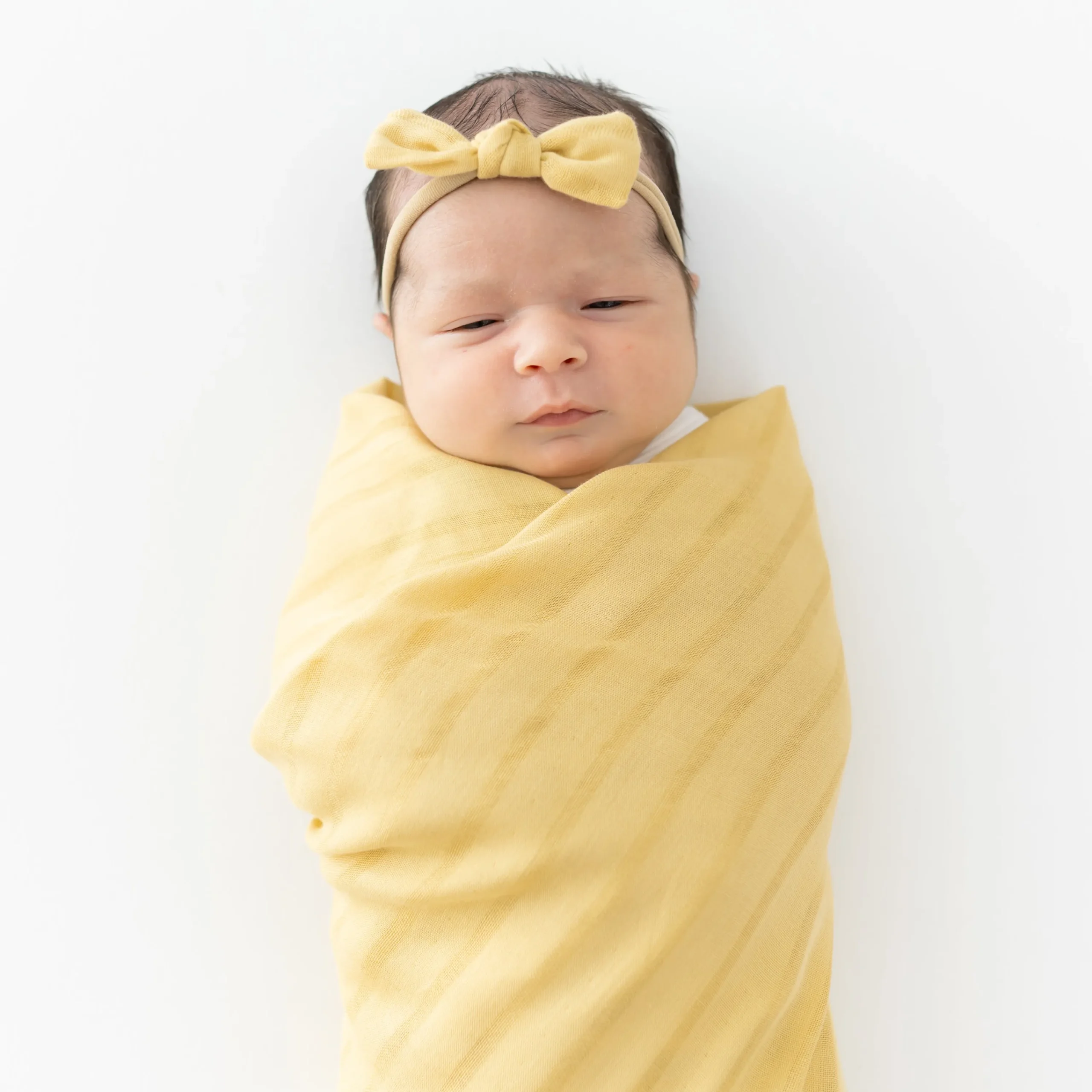 Kyte Baby Bamboo Muslin Tiny Bow in Sandcastle
