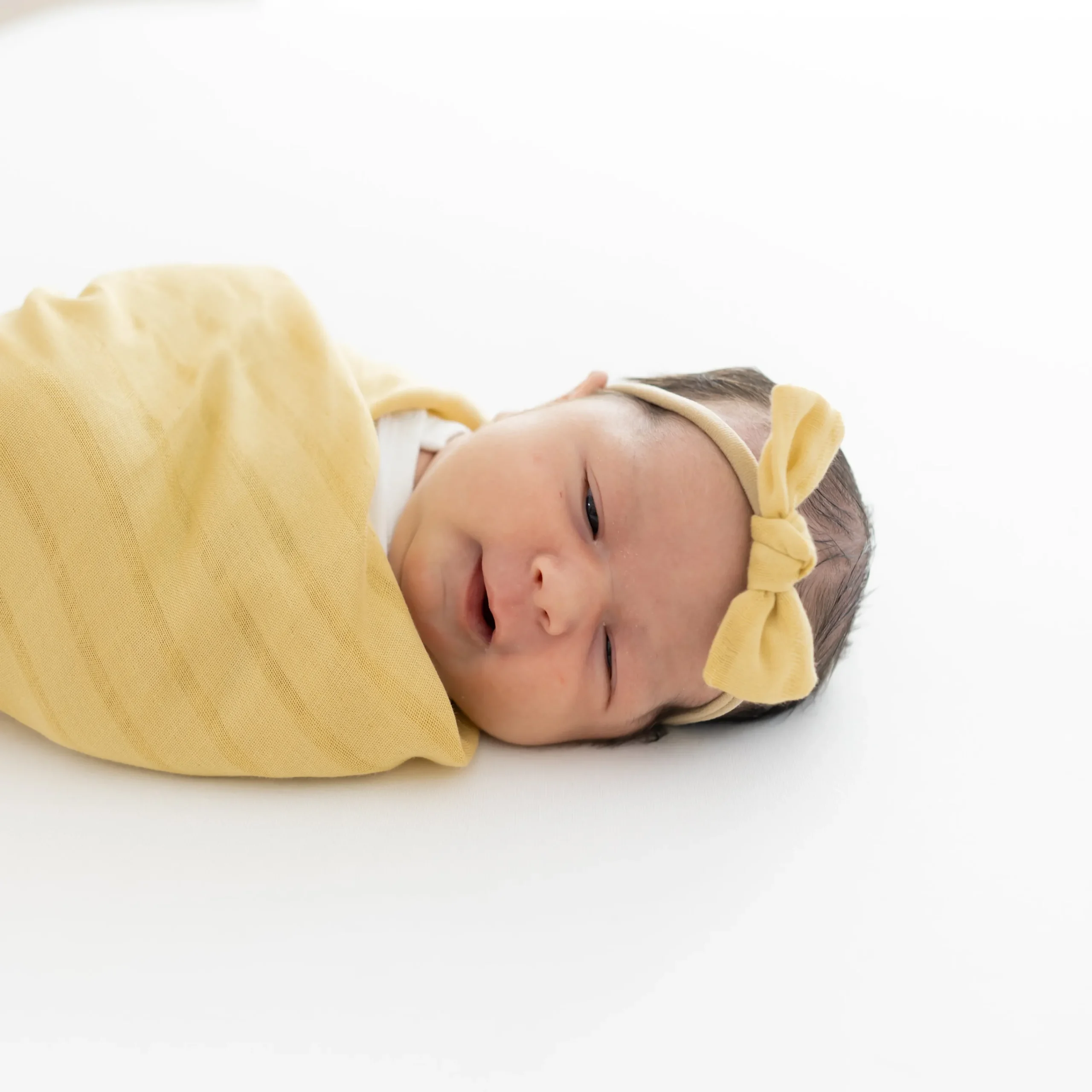 Kyte Baby Bamboo Muslin Tiny Bow in Sandcastle