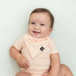 Kyte Baby Bib in Canyon Hot