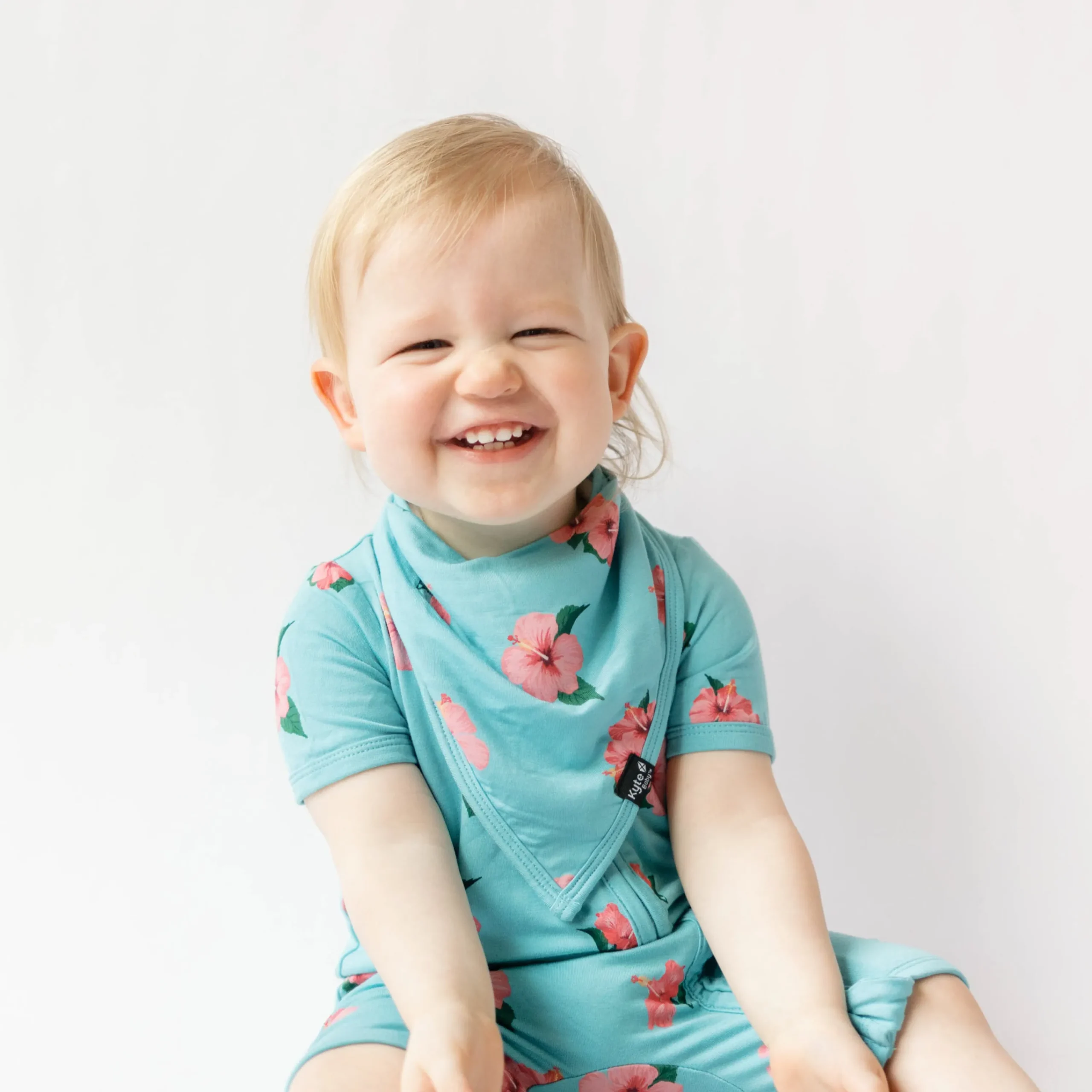 Kyte Baby Bib in Hibiscus Hot