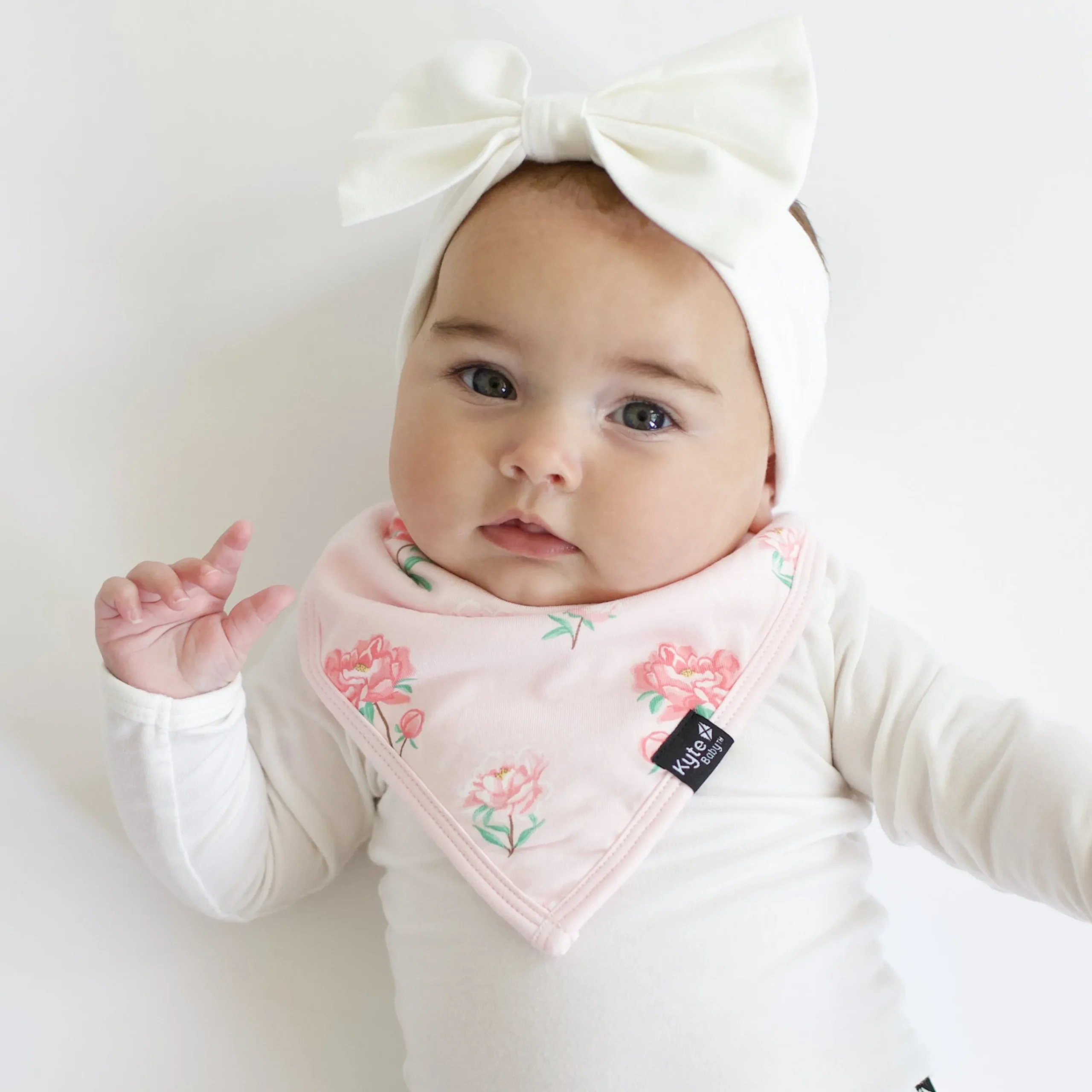 Kyte Baby Bib in Sakura Peony Hot