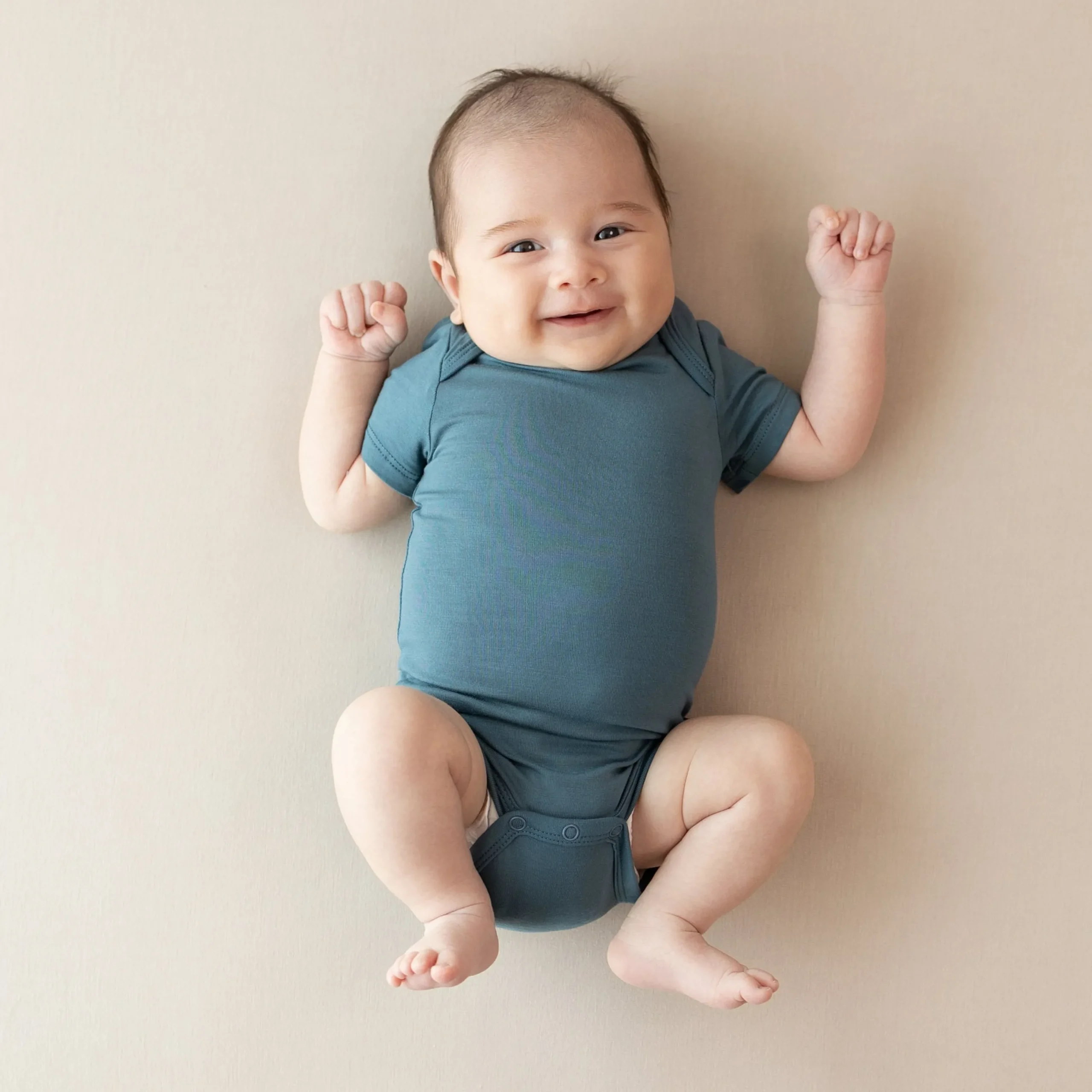 Kyte Baby Bodysuit in Atlantic Best