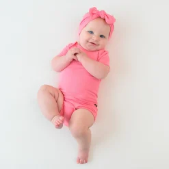 Kyte Baby Bodysuit in Guava New