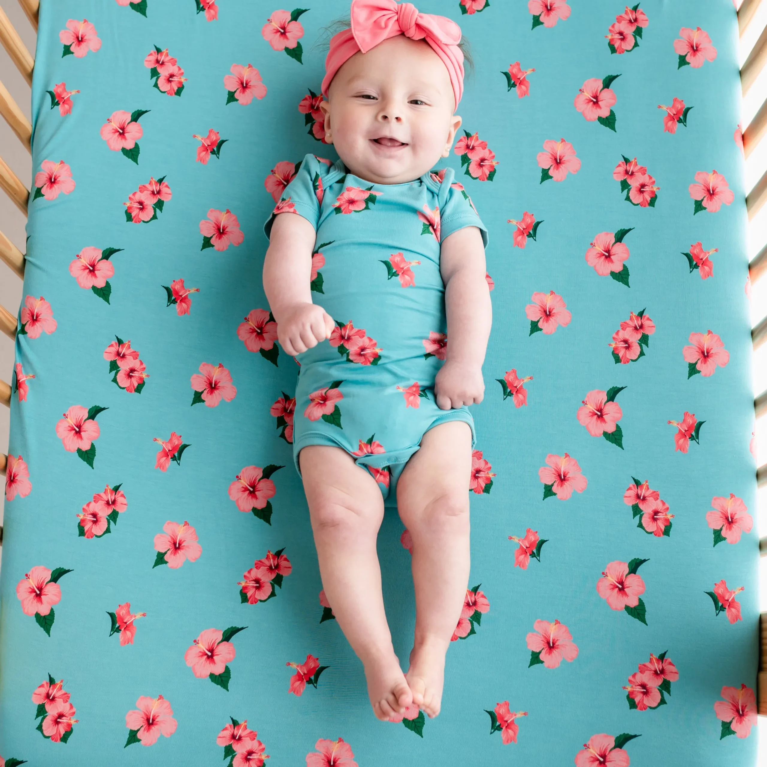 Kyte Baby Bodysuit in Hibiscus