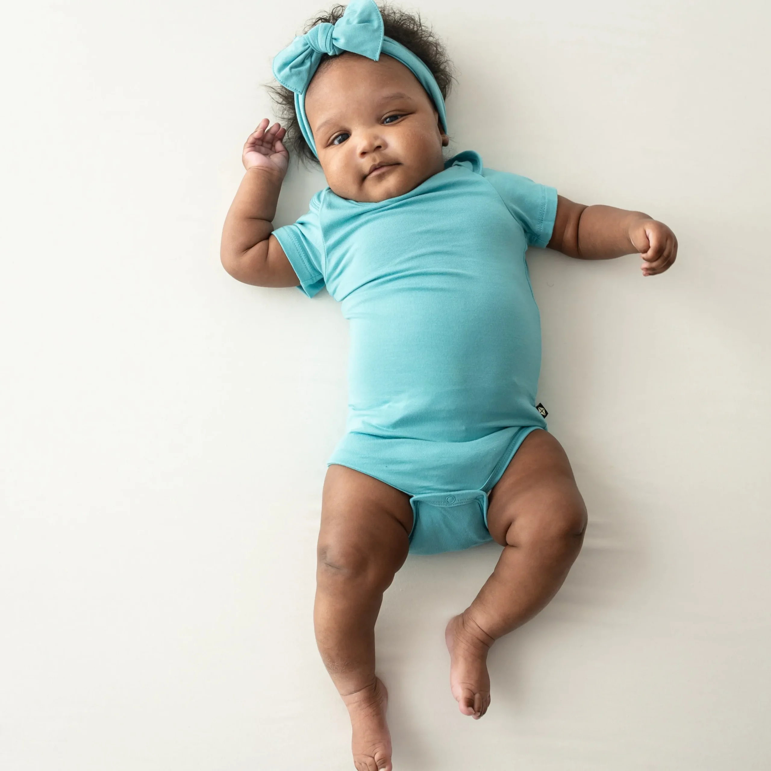 Kyte Baby Bodysuit in Makai Sale