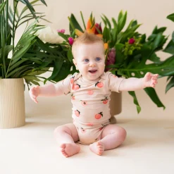 Kyte Baby Bodysuit in Peach Hot