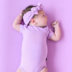 Kyte Baby Bodysuit in Poi New
