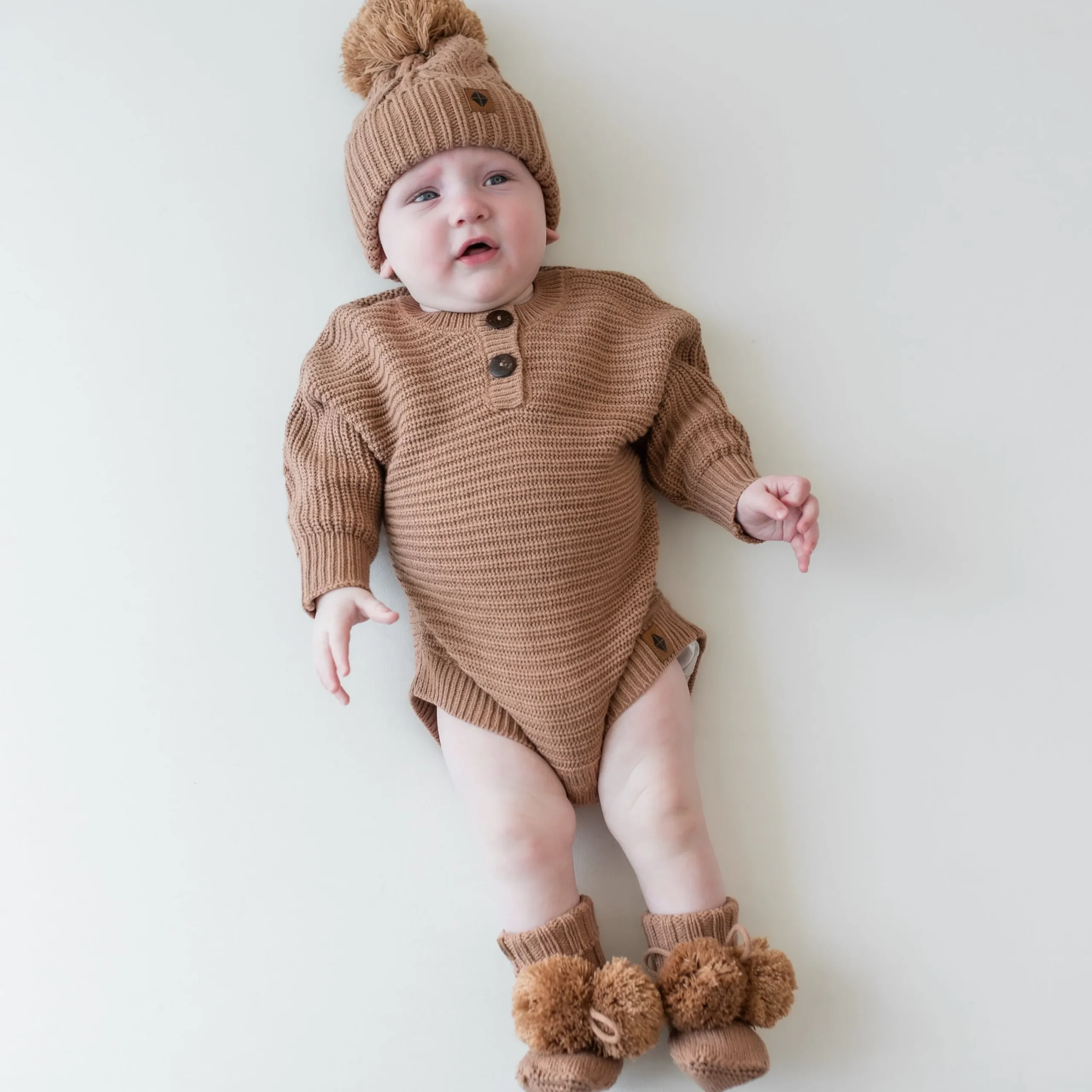 Kyte Baby Chunky Cable Knit Beanie in Latte