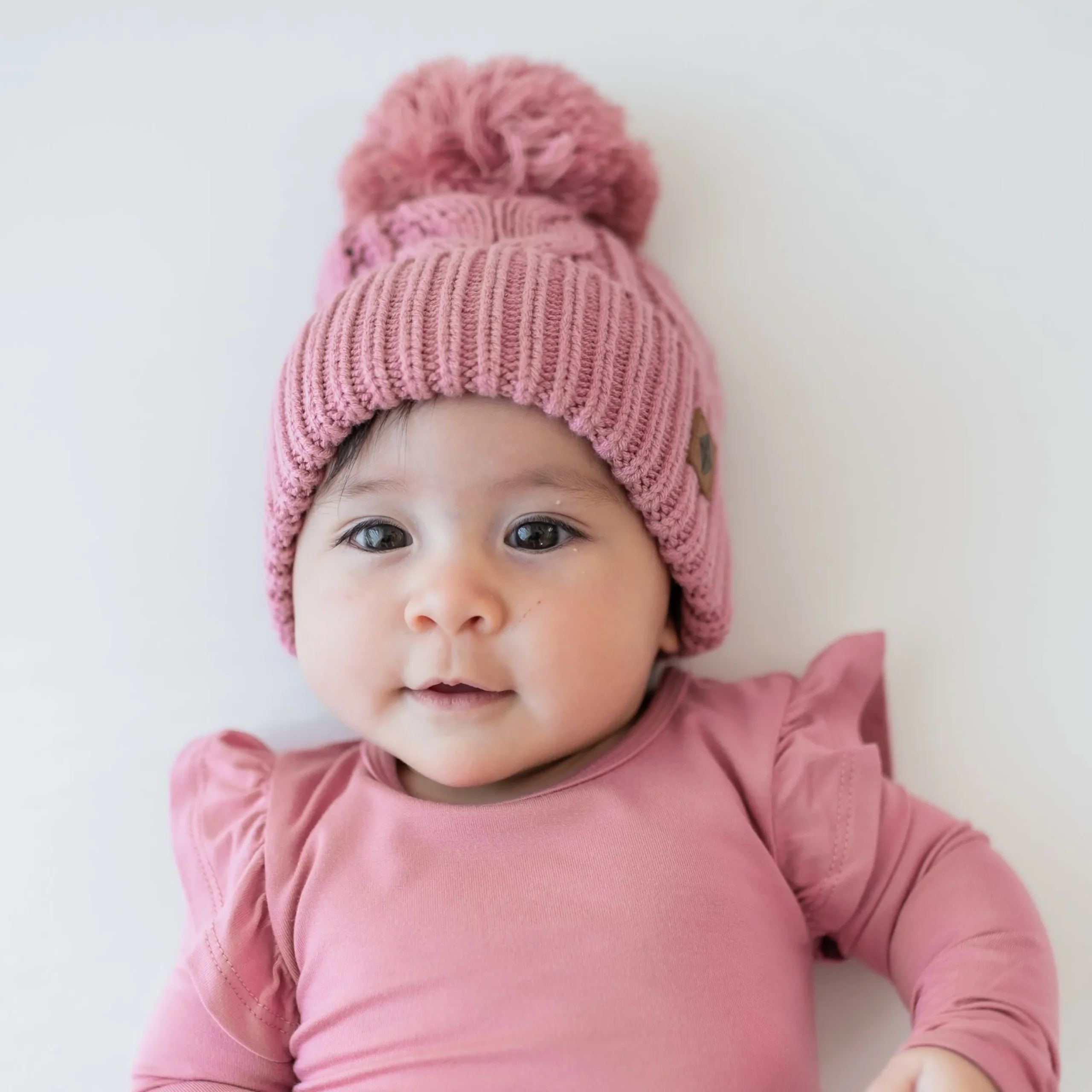 Kyte Baby Chunky Cable Knit Beanie in Apple Blossom