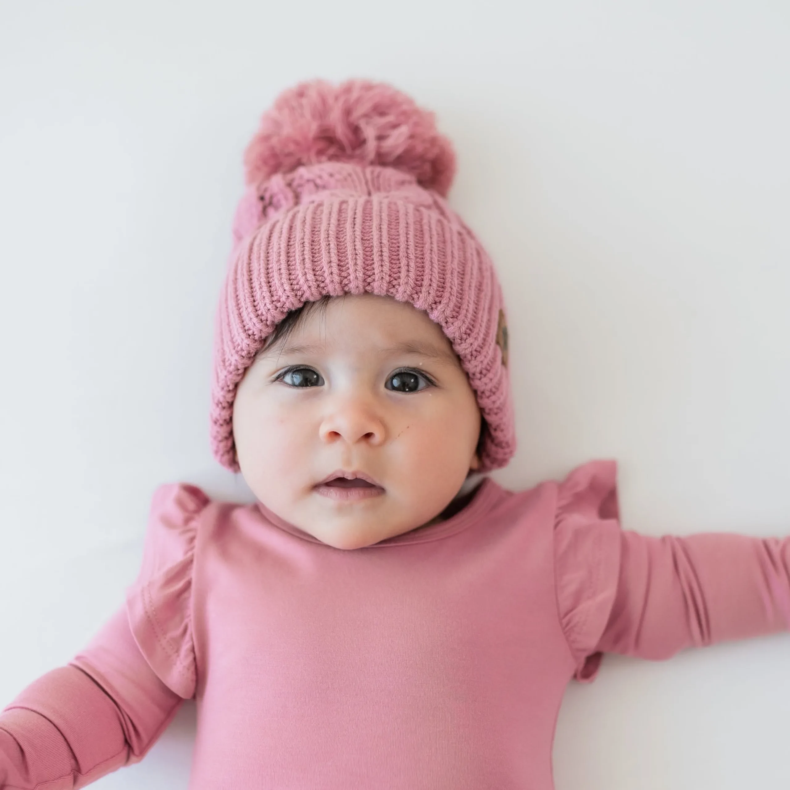 Kyte Baby Chunky Cable Knit Beanie in Apple Blossom