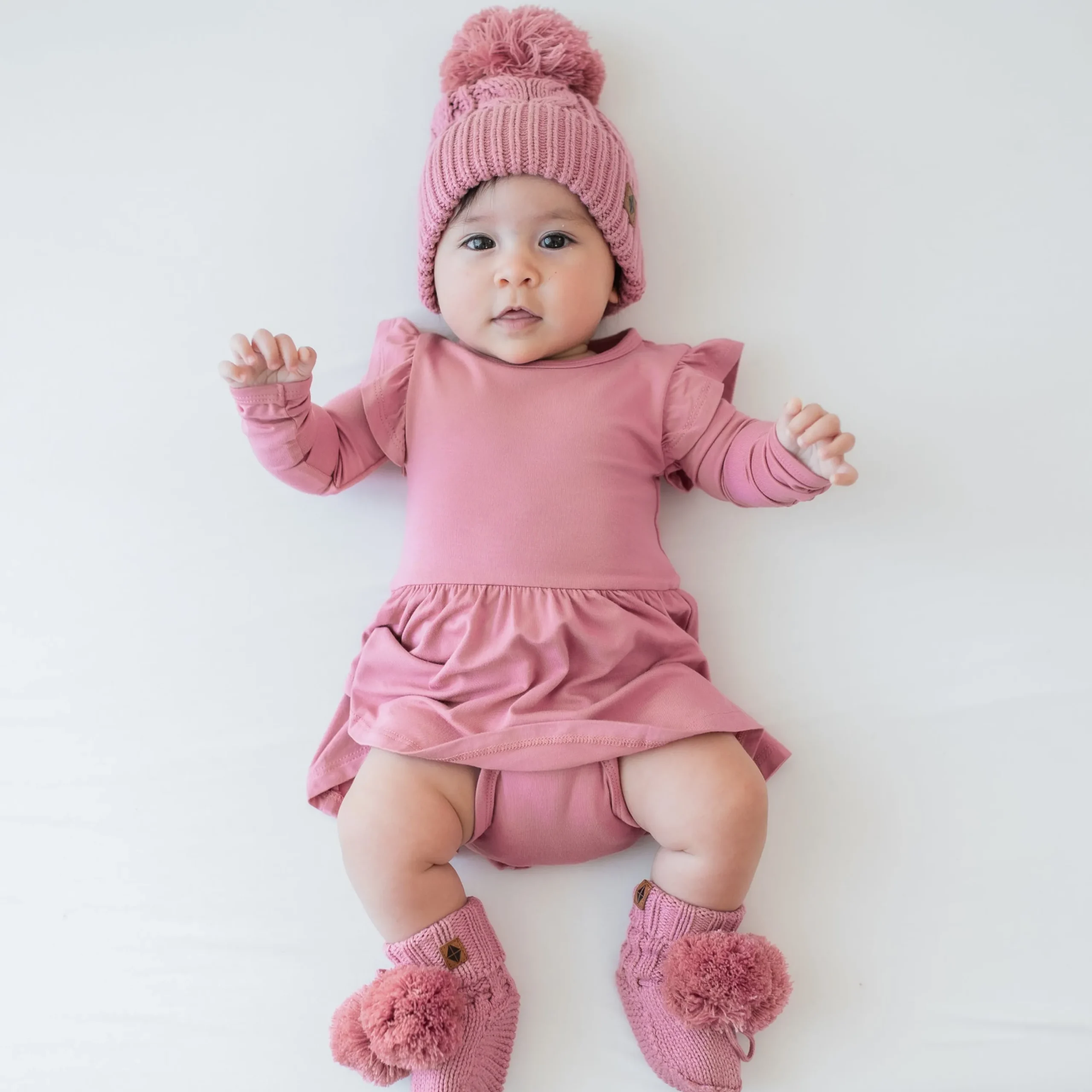 Kyte Baby Chunky Cable Knit Beanie in Apple Blossom