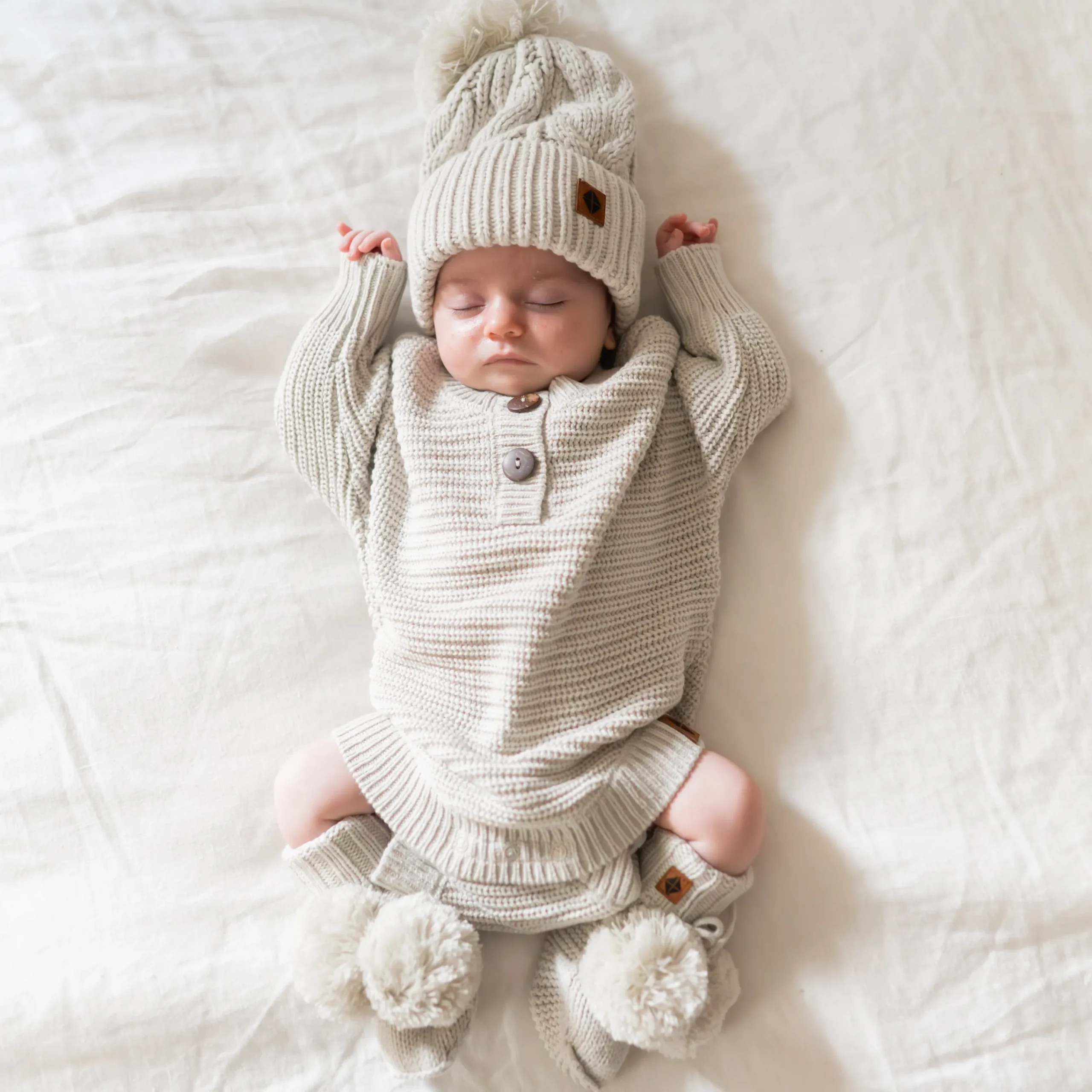 Kyte Baby Chunky Knit Romper in Oat