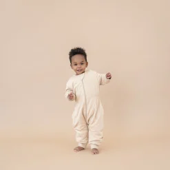 Kyte Baby Cozy Playsuit in Bisque