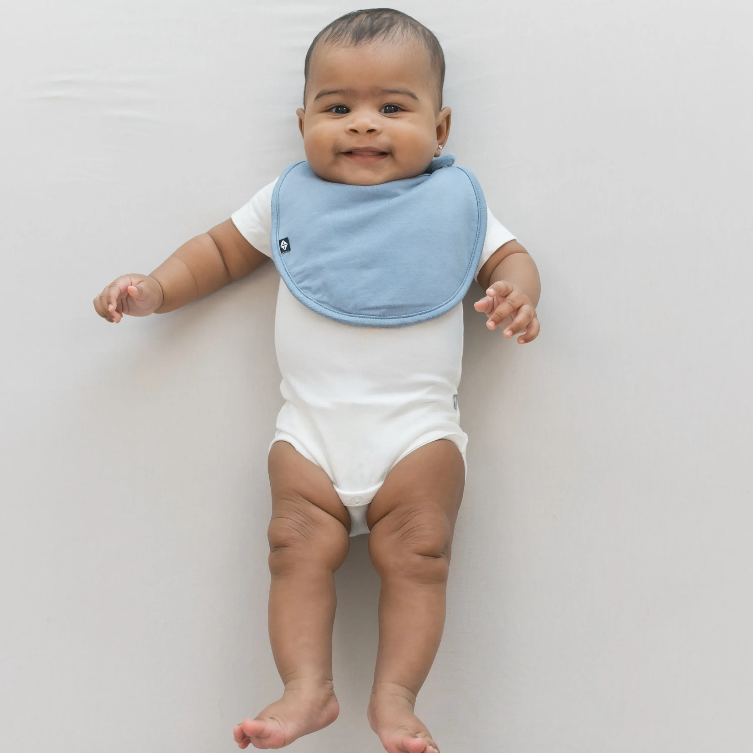 Kyte Baby Cushy Bib in Slate Clearance