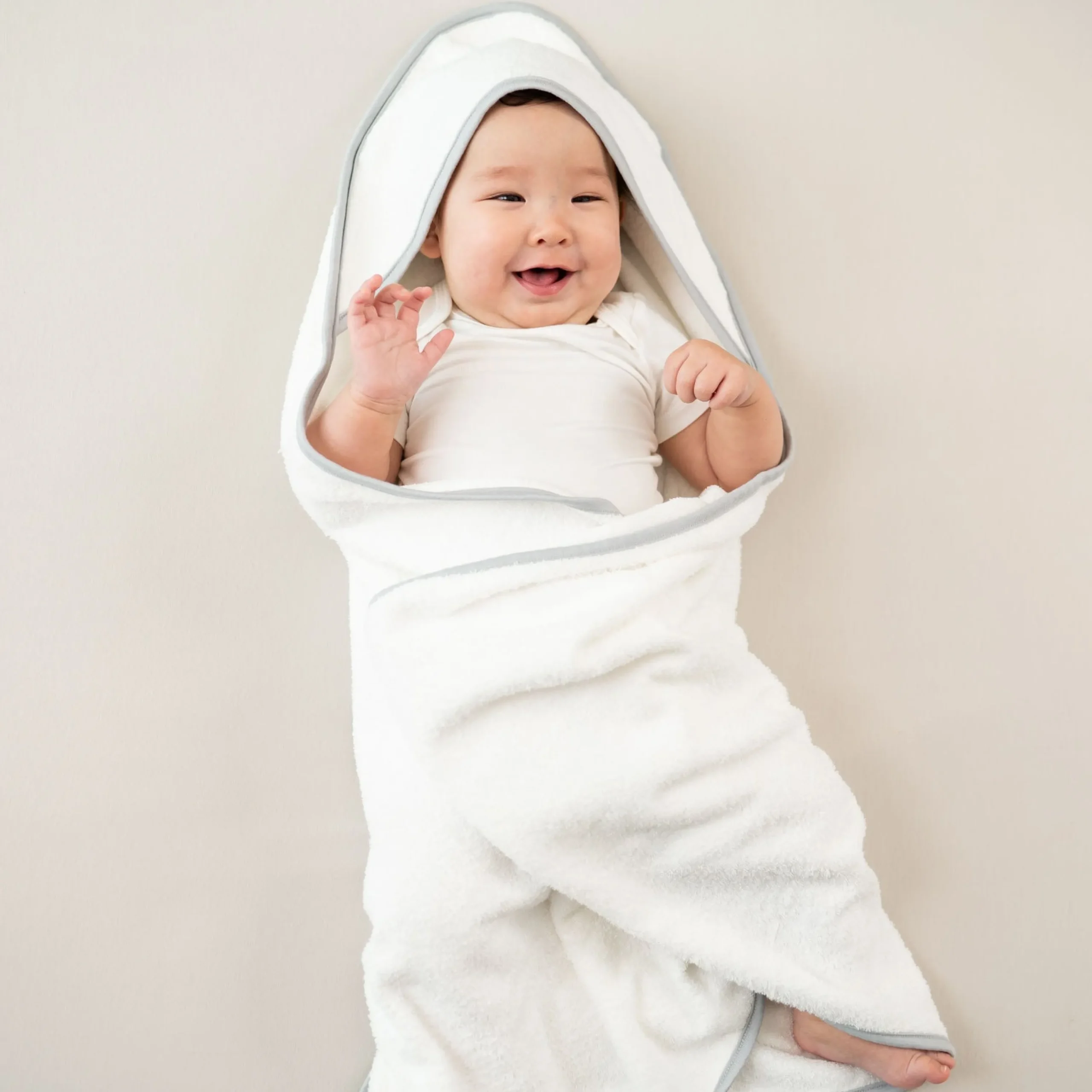 Kyte Baby Hooded Bath Towel in Cloud with Storm Trim Hot