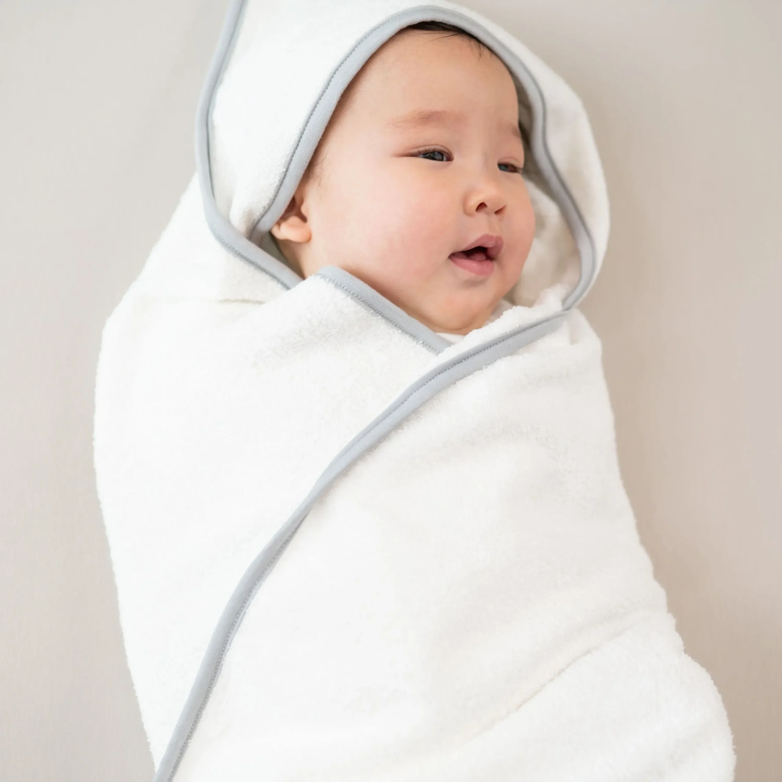Kyte Baby Hooded Bath Towel in Cloud with Storm Trim Hot
