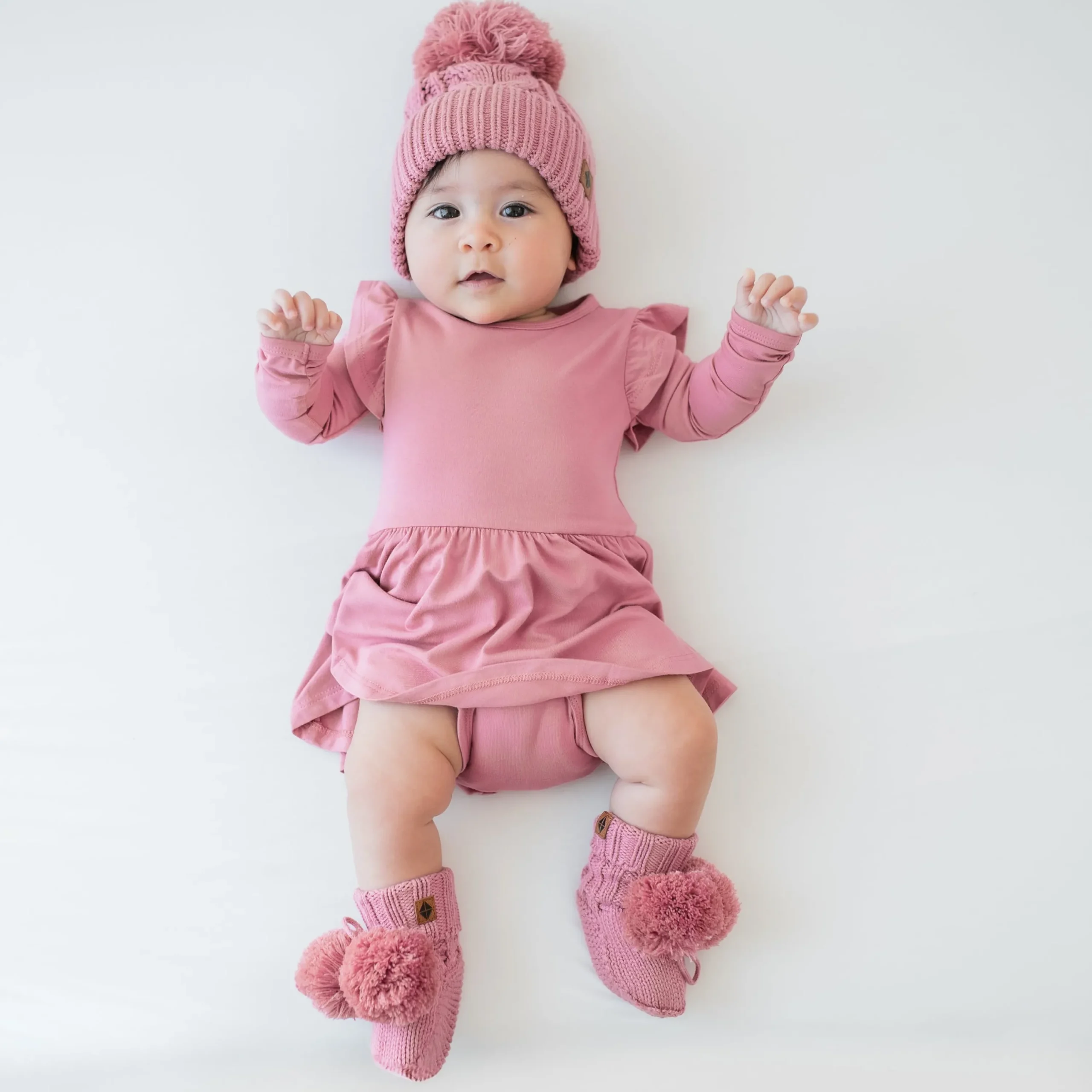 Kyte Baby Knit Booties in Apple Blossom