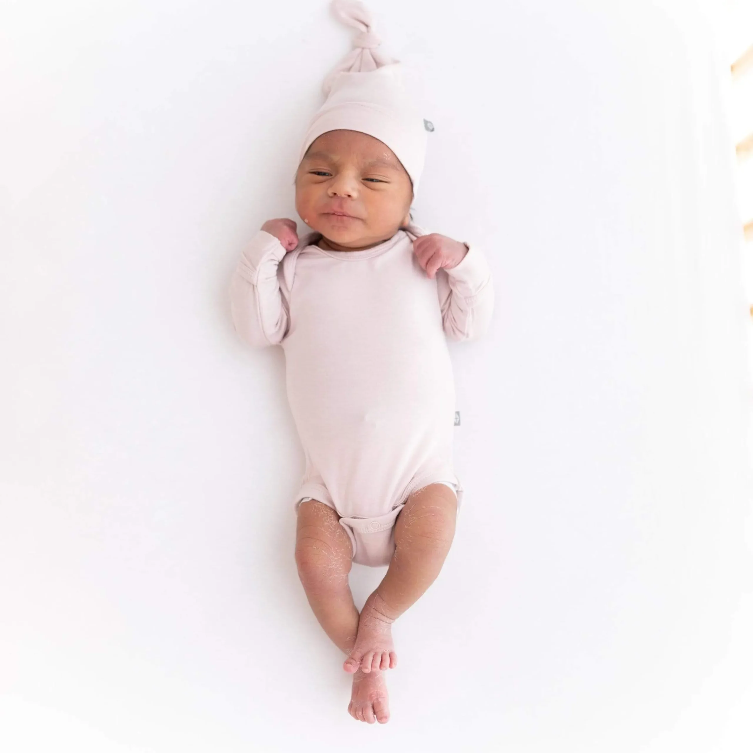 Kyte Baby Long Sleeve Bodysuit in Blush Clearance