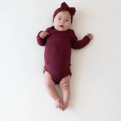Kyte Baby Long Sleeve Bodysuit in Burgundy Hot