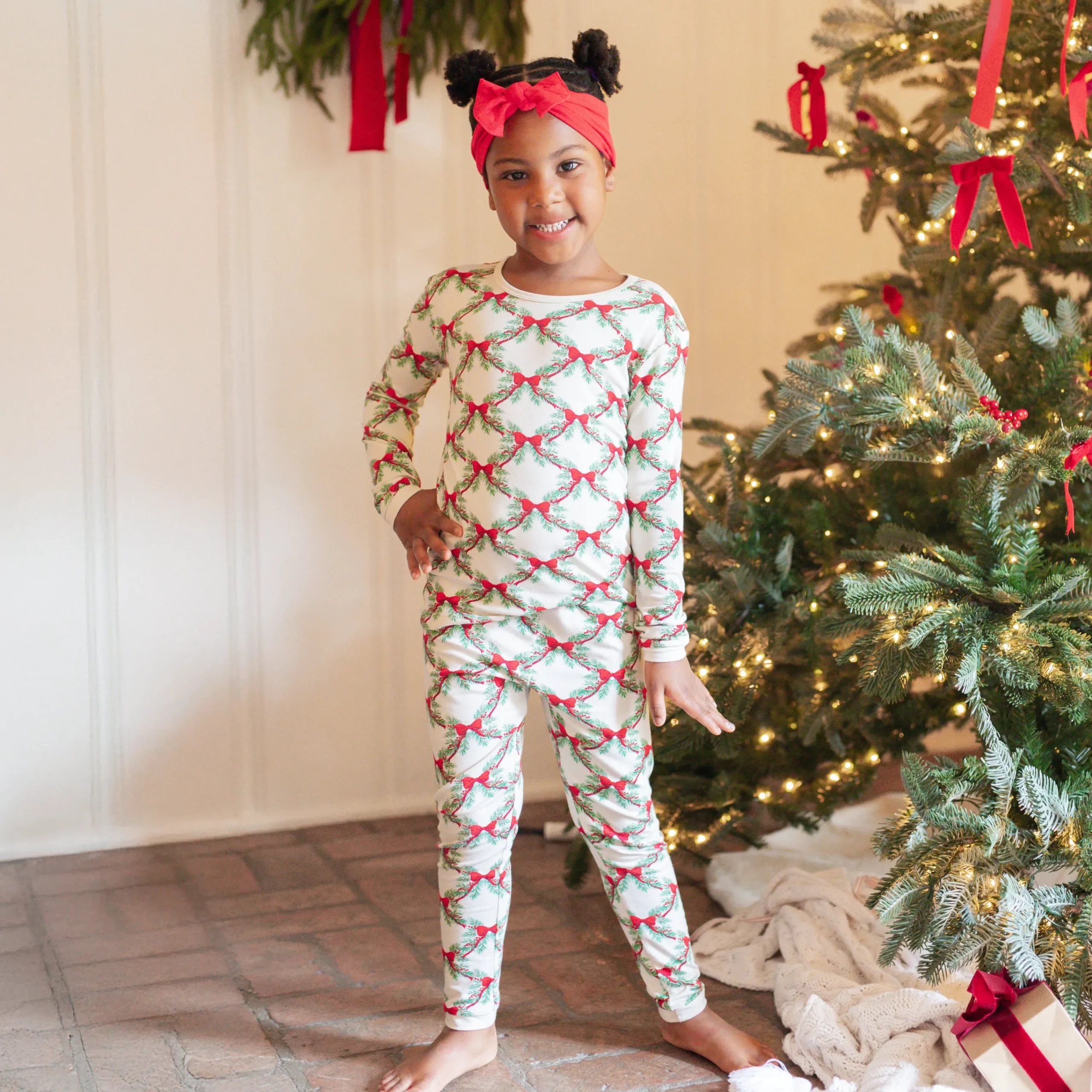 Kyte Baby Long Sleeve Pajamas in Holiday Bow Outlet