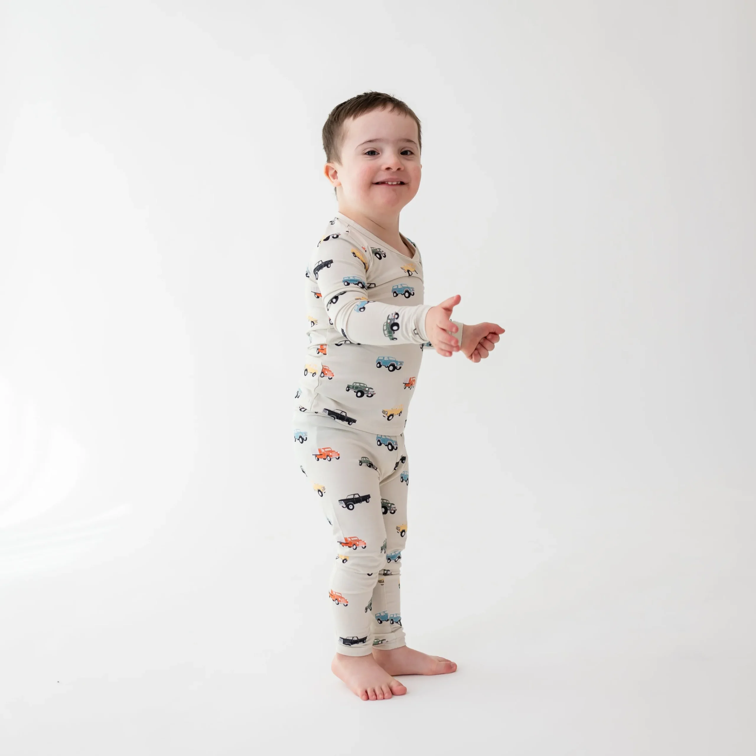 Kyte Baby Long Sleeve Pajamas in Vintage Truck Sale