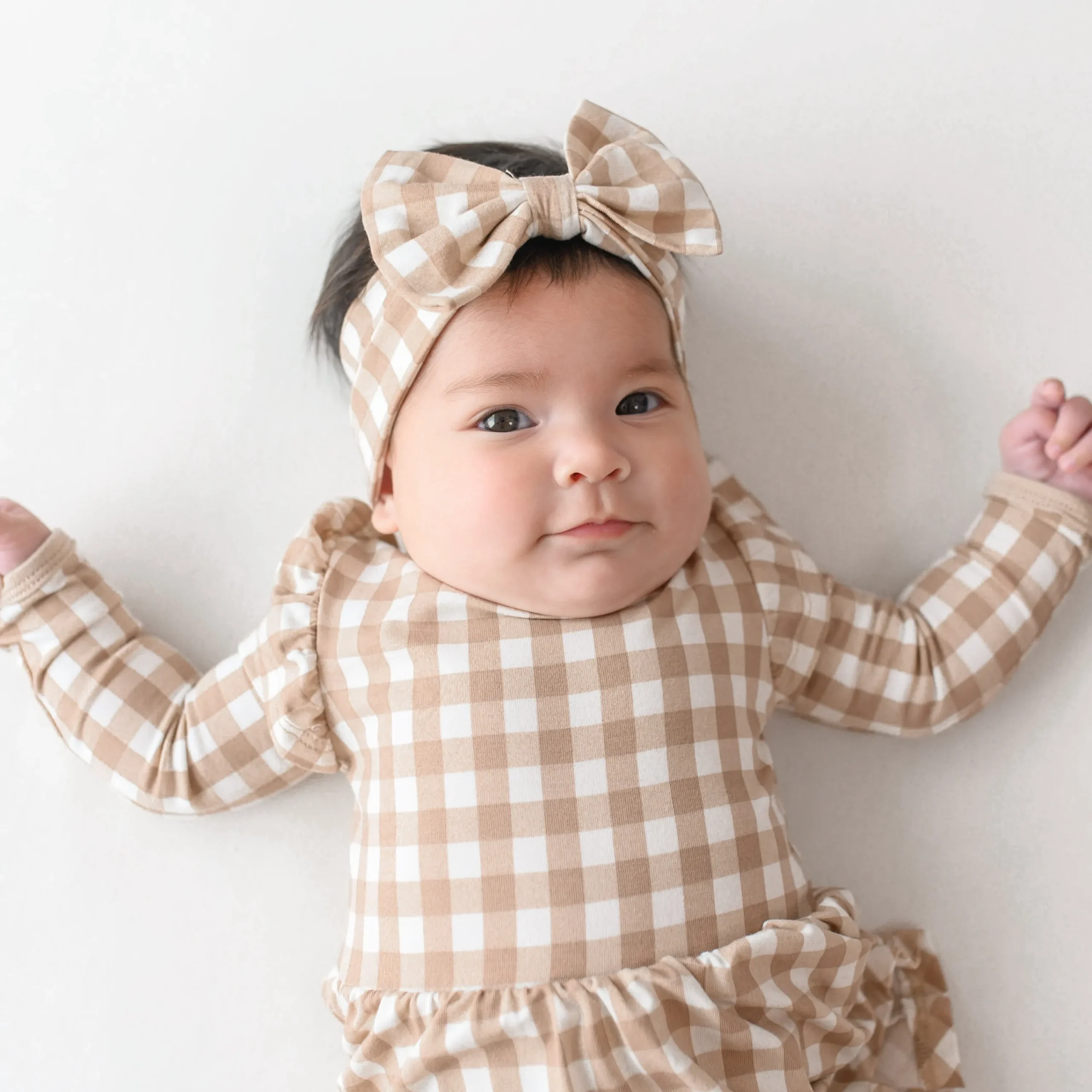 Kyte Baby Long Sleeve Twirl Bodysuit Dress in Gingham Bisque Outlet