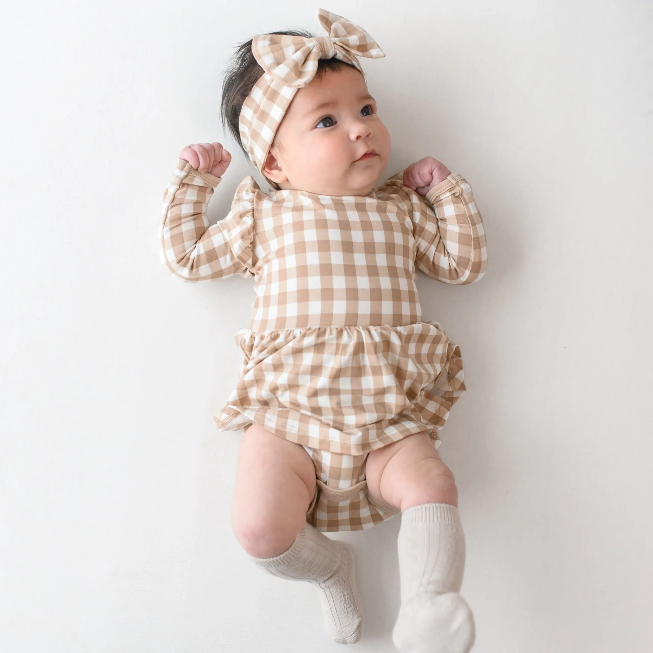 Kyte Baby Long Sleeve Twirl Bodysuit Dress in Gingham Bisque Outlet