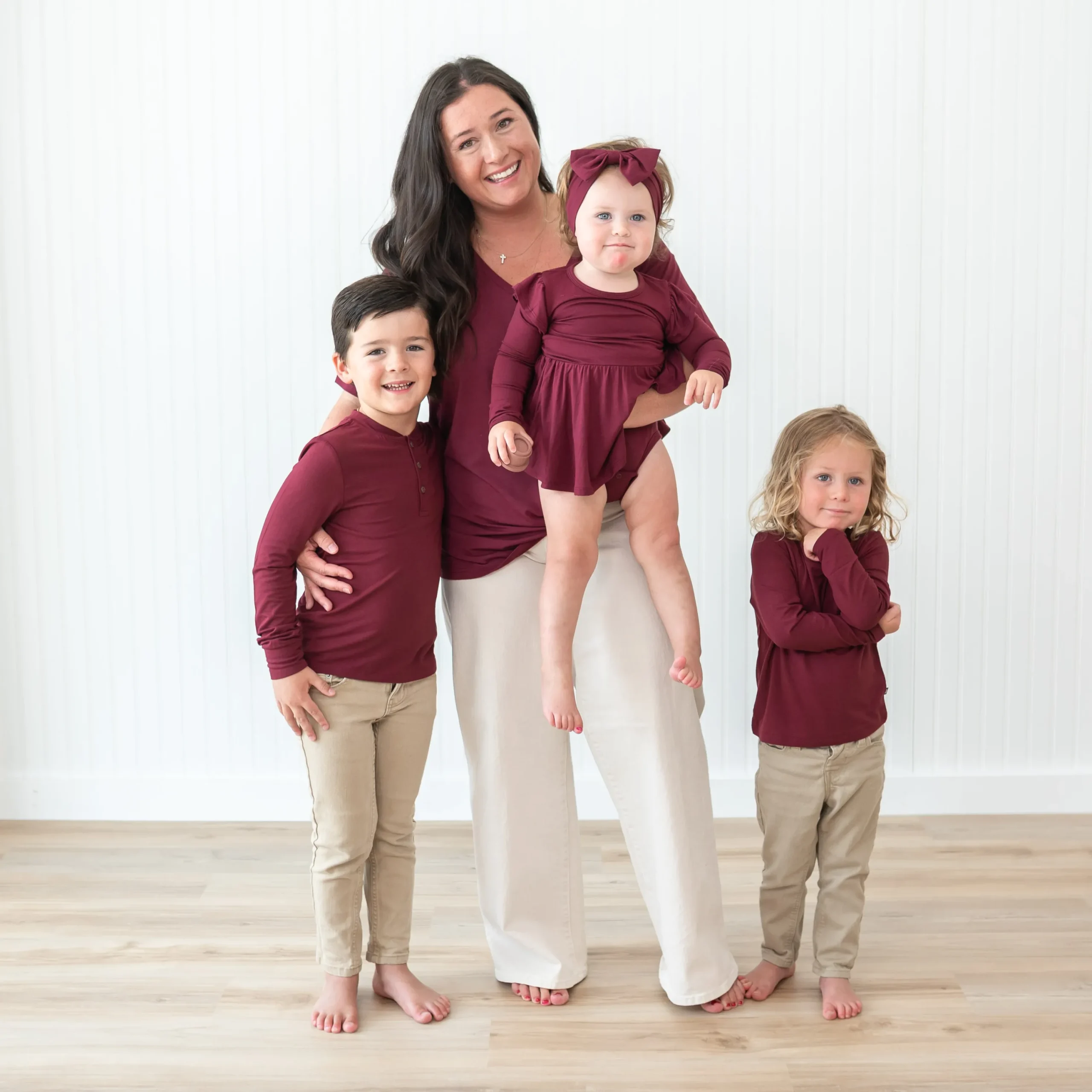 Kyte Baby Long Sleeve Twirl Bodysuit Dress in Burgundy Hot