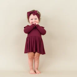 Kyte Baby Long Sleeve Twirl Bodysuit Dress in Burgundy Hot