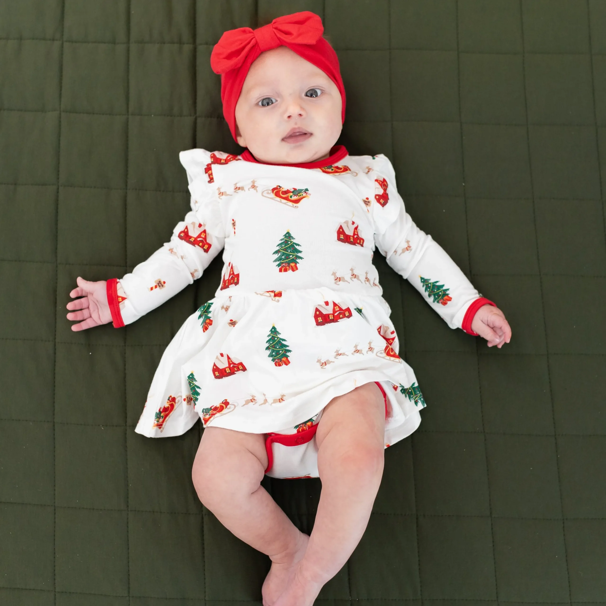 Kyte Baby Long Sleeve Twirl Bodysuit Dress in Santa Sleigh New