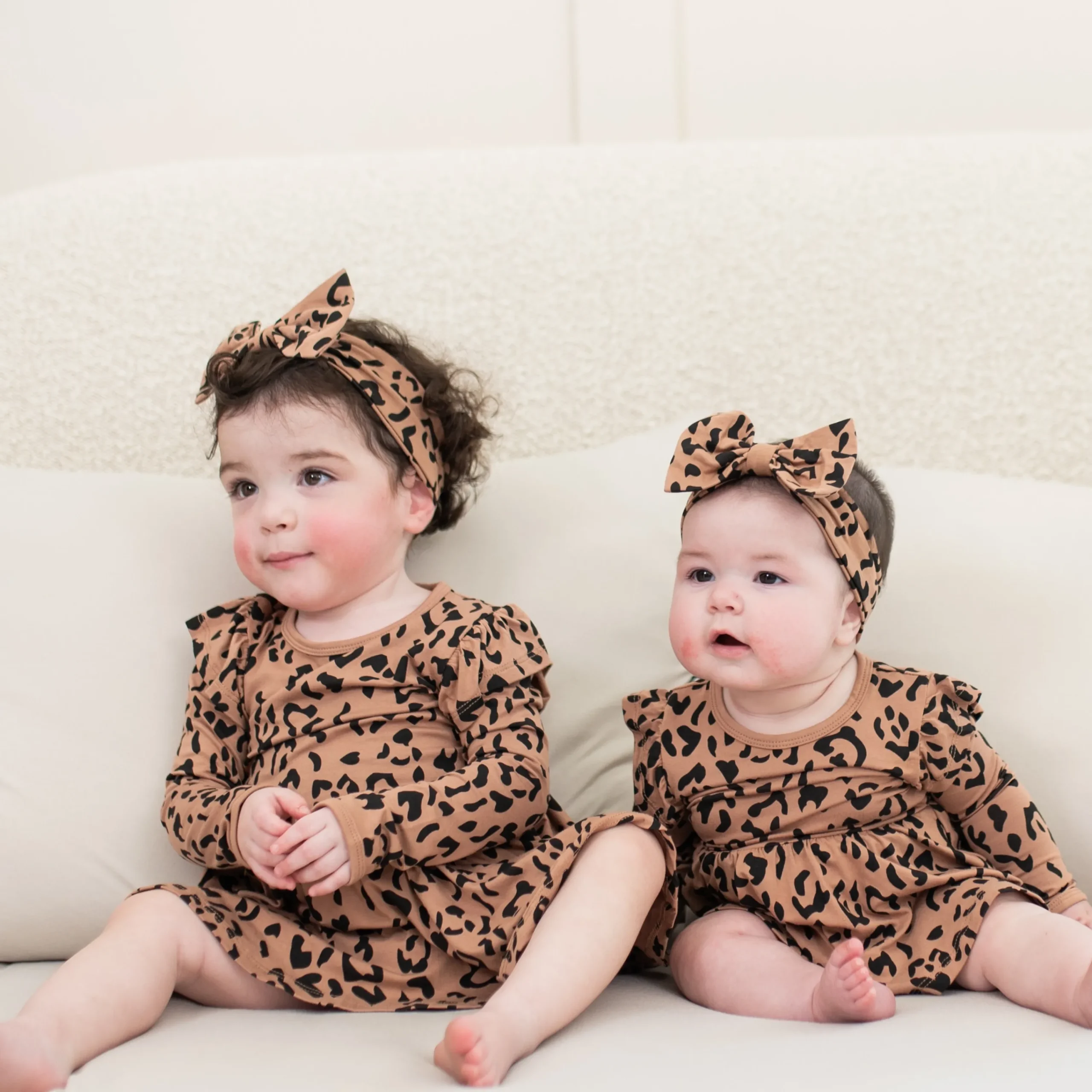 Kyte Baby Long Sleeve Twirl Bodysuit Dress in Latte Leopard Sale