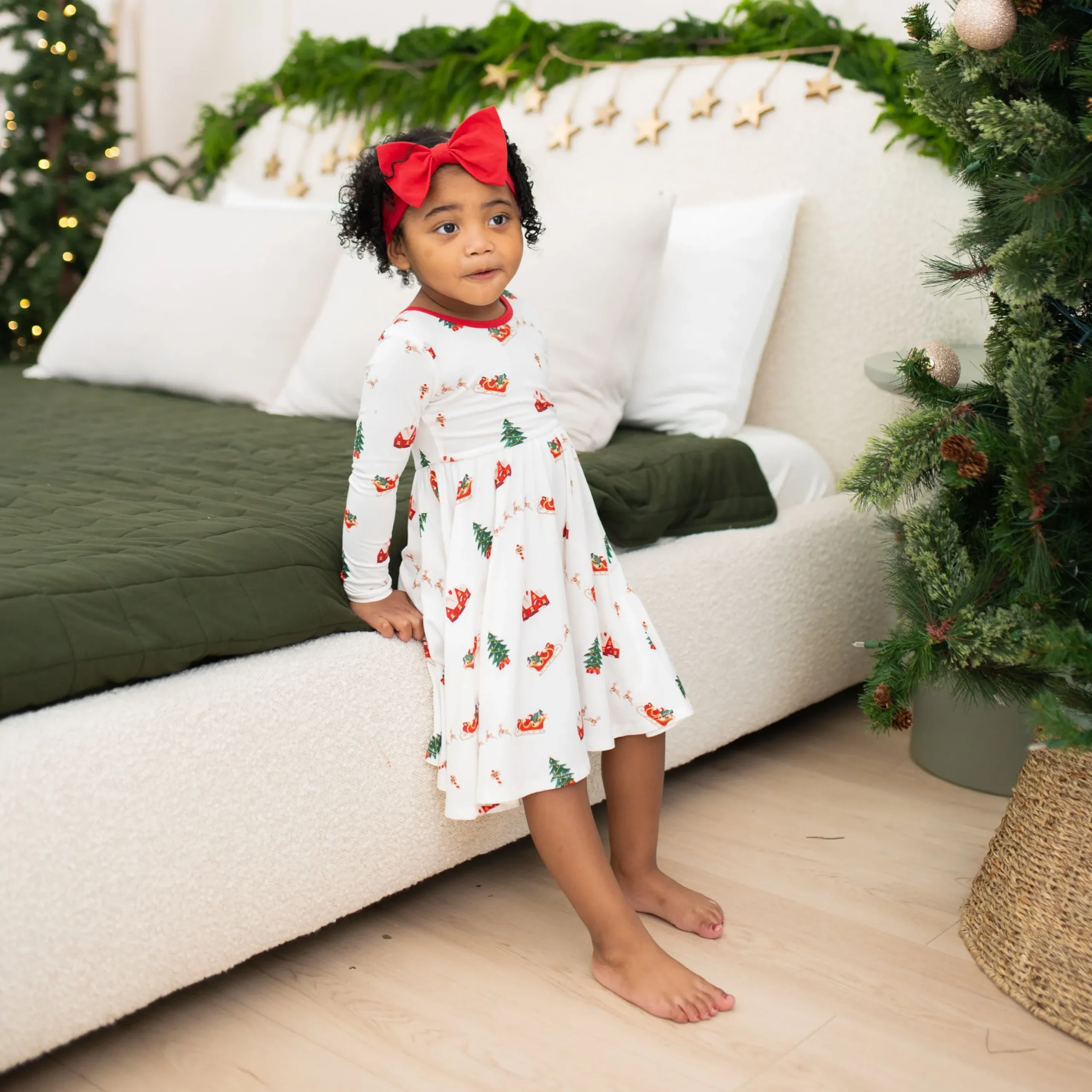 Kyte Baby Long Sleeve Twirl Dress in Santa Sleigh Outlet