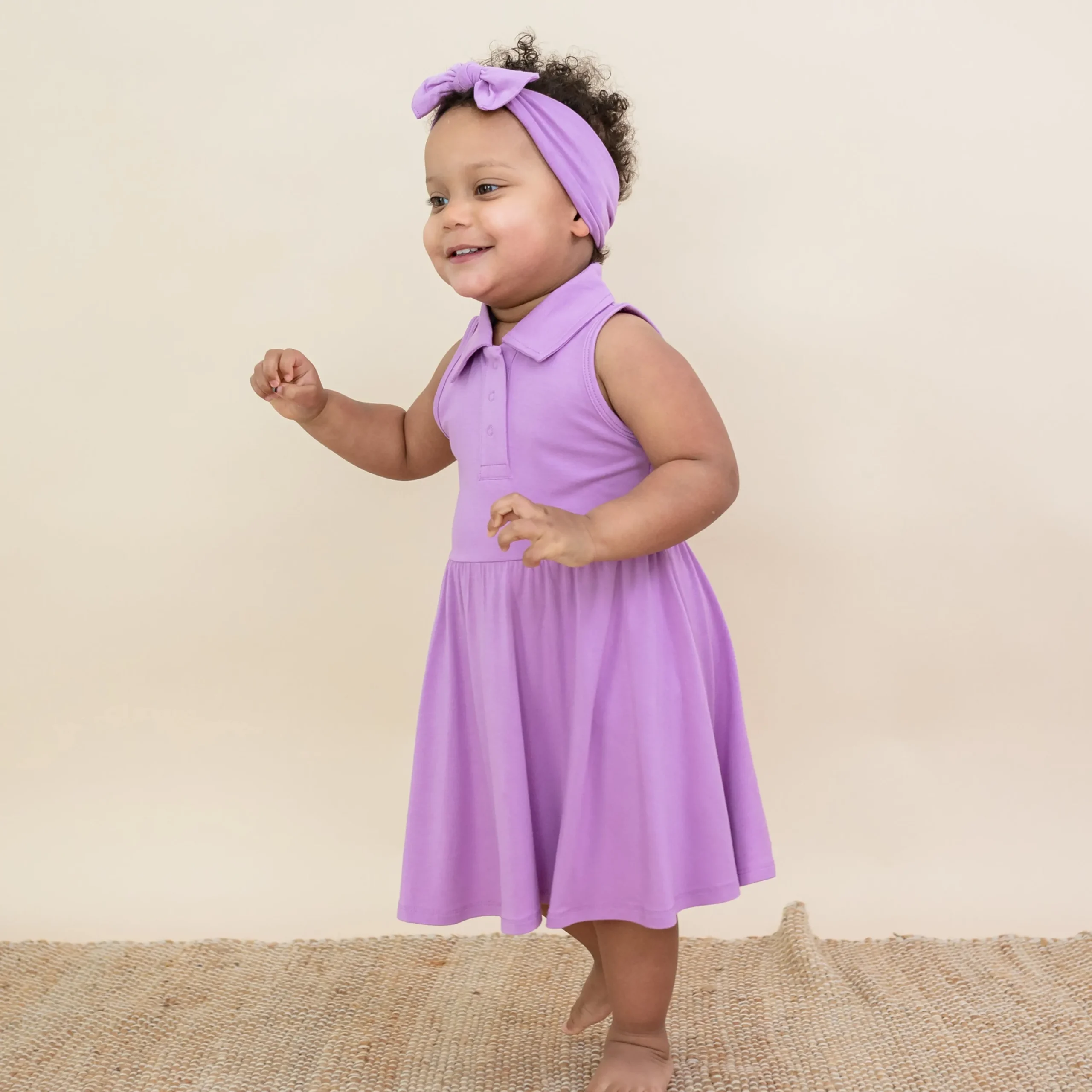 Kyte Baby Polo Bodysuit Dress in Poi Clearance