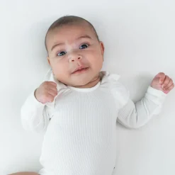 Kyte Baby Ribbed Long Sleeve Ruffle Leotard in Cloud