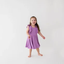 Kyte Baby Ribbed Peplum Dress Set in Poi