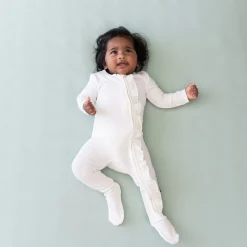 Kyte Baby Ribbed Ruffle Zipper Footie in Cloud