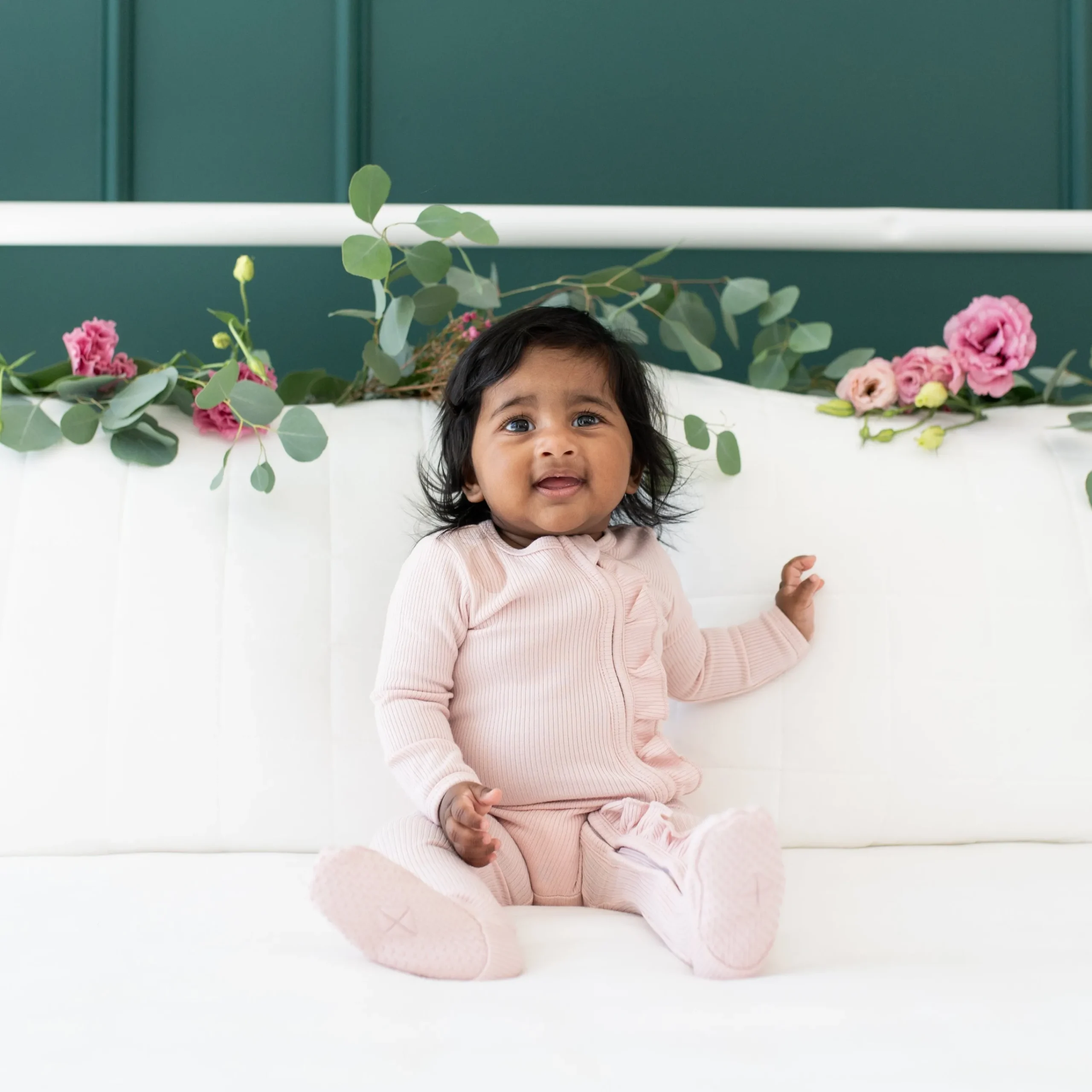 Kyte Baby Ribbed Ruffle Zipper Footie in Blush New