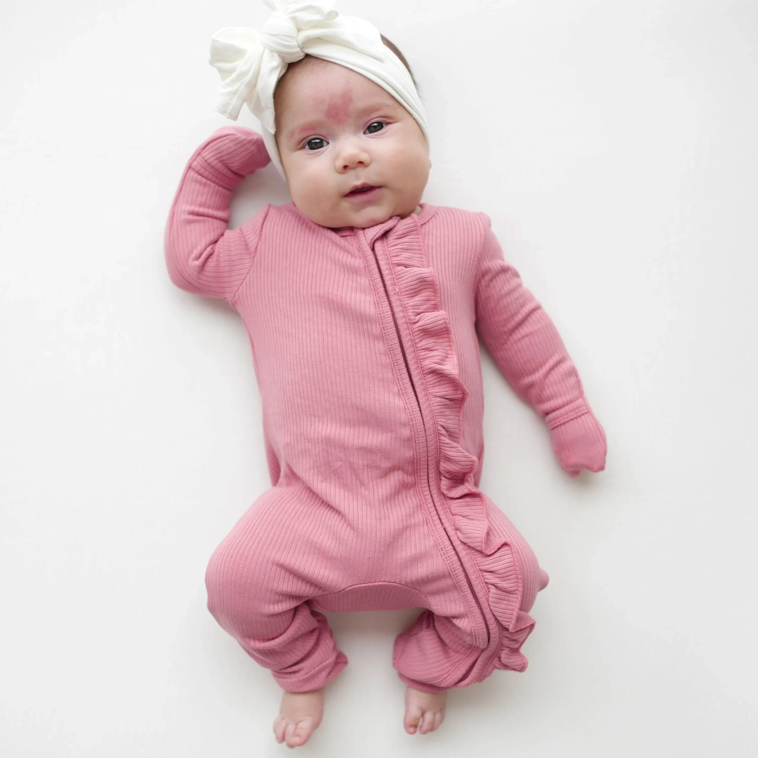 Kyte Baby Ribbed Ruffle Zipper Romper in Apple Blossom Online