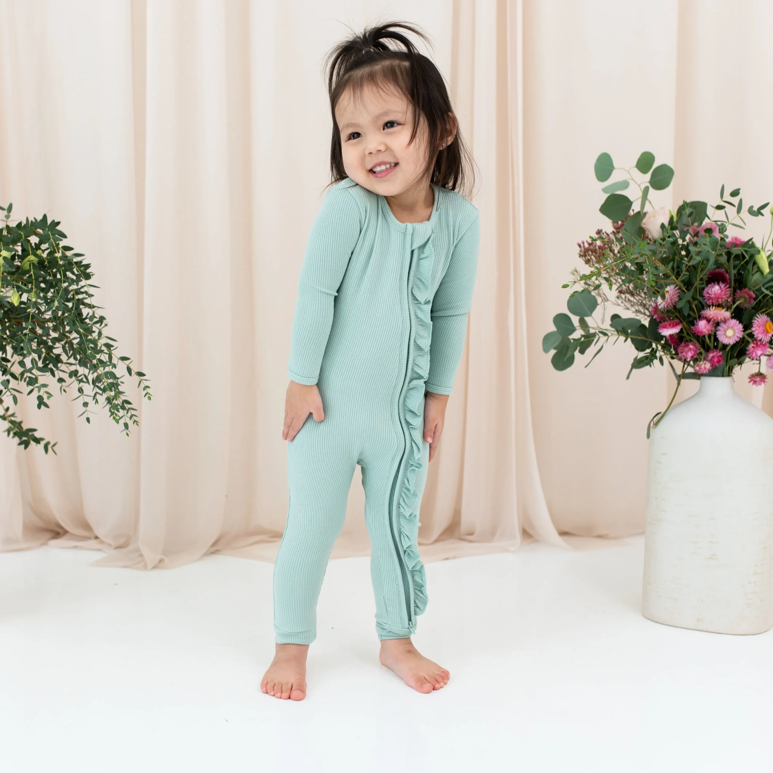 Kyte Baby Ribbed Ruffle Zipper Romper in Sage Outlet