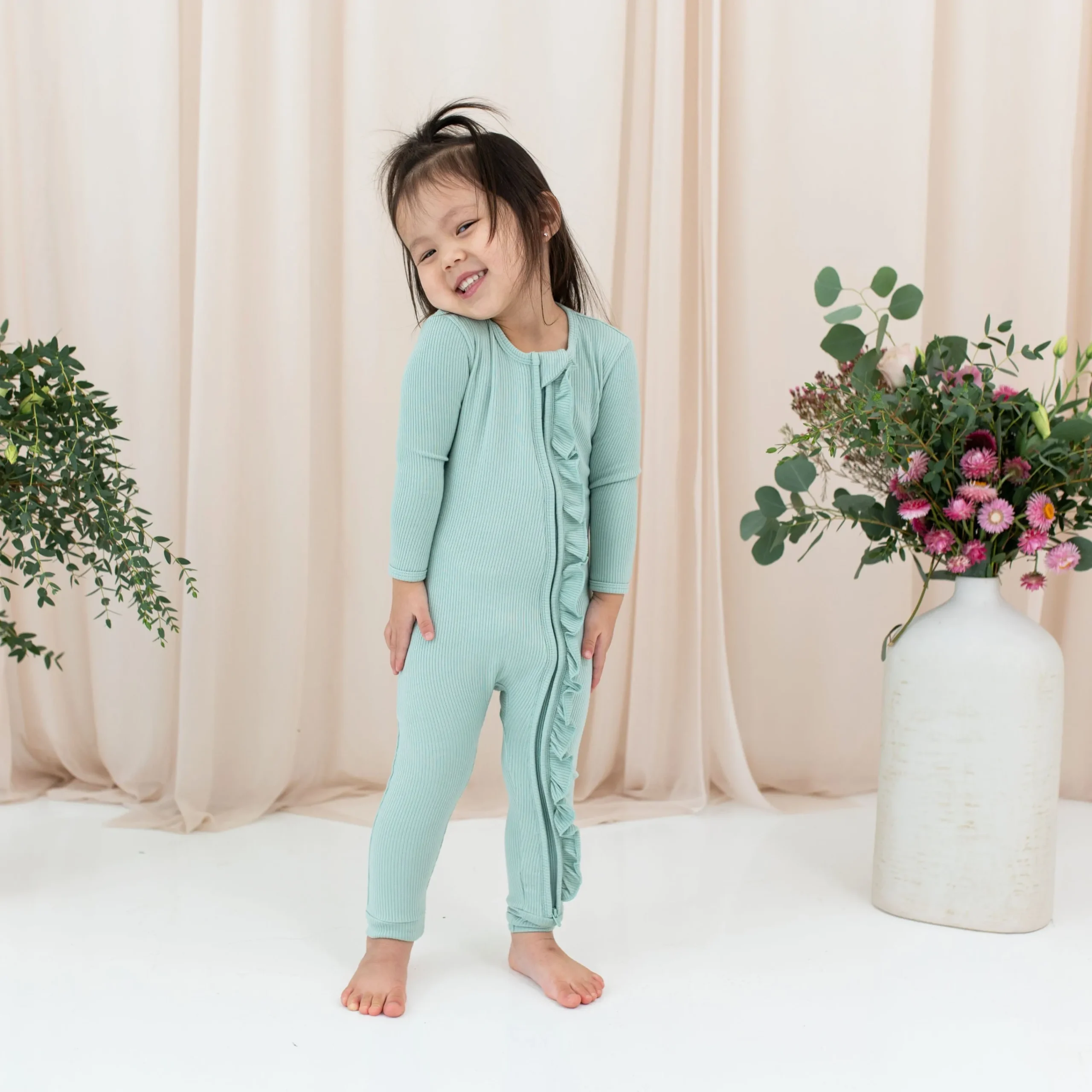 Kyte Baby Ribbed Ruffle Zipper Romper in Sage Outlet
