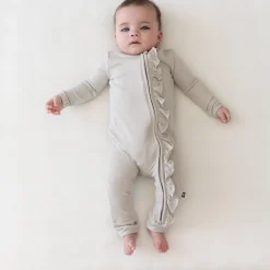 Kyte Baby Ribbed Ruffle Zipper Romper in Oat Clearance
