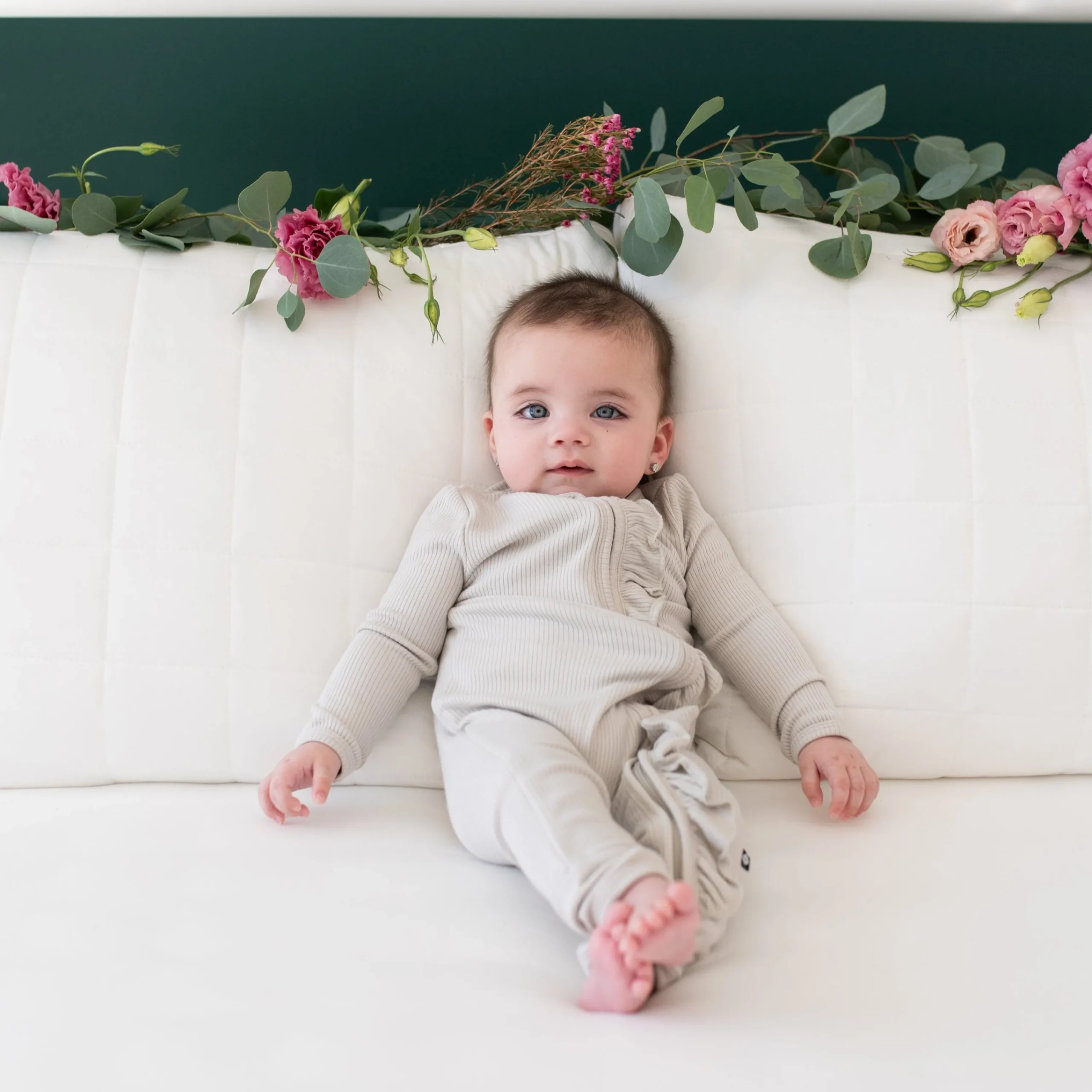 Kyte Baby Ribbed Ruffle Zipper Romper in Oat Clearance