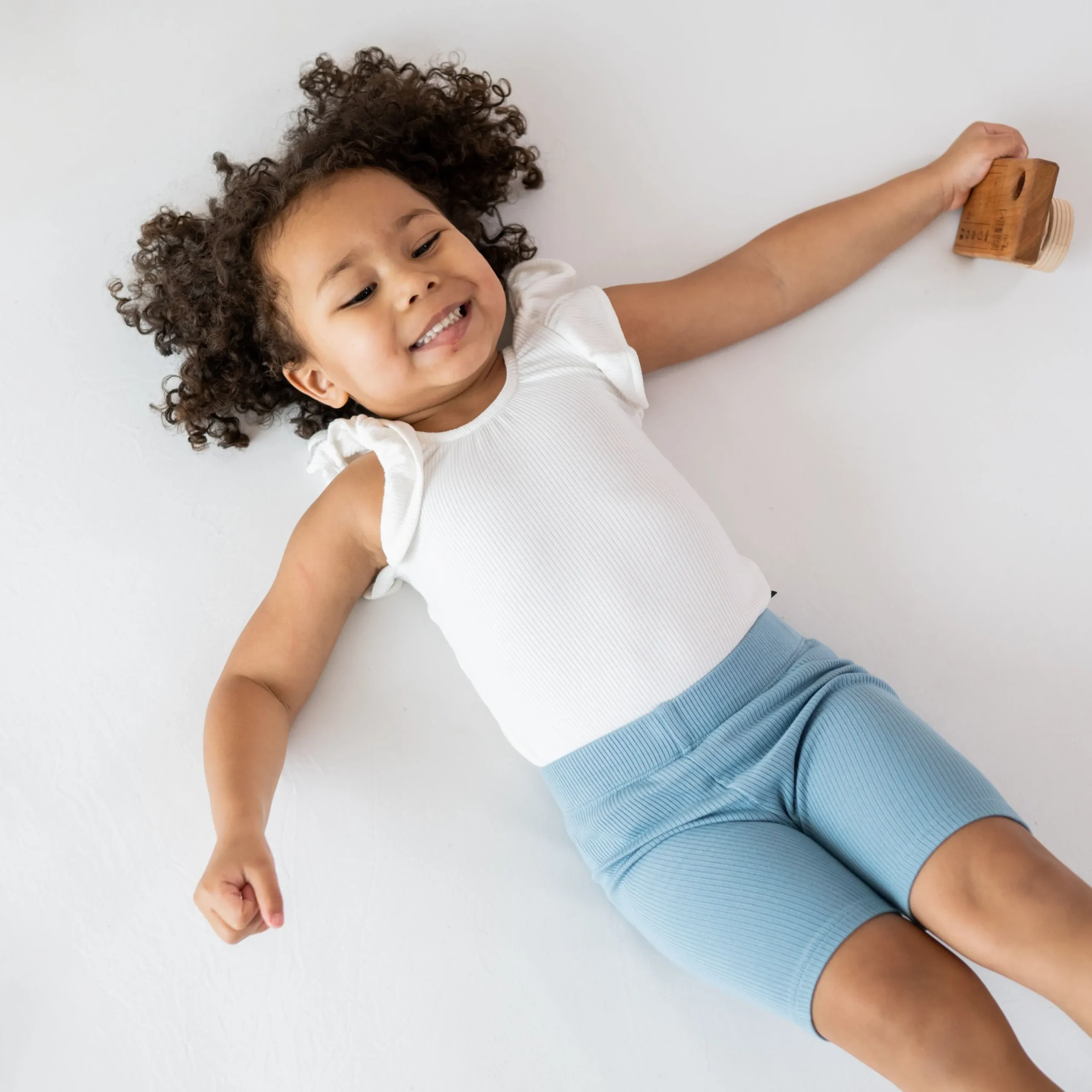 Kyte Baby Ribbed Sleeveless Ruffle Leotard in Cloud Online