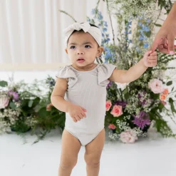 Kyte Baby Ribbed Sleeveless Ruffle Leotard in Oat Discount