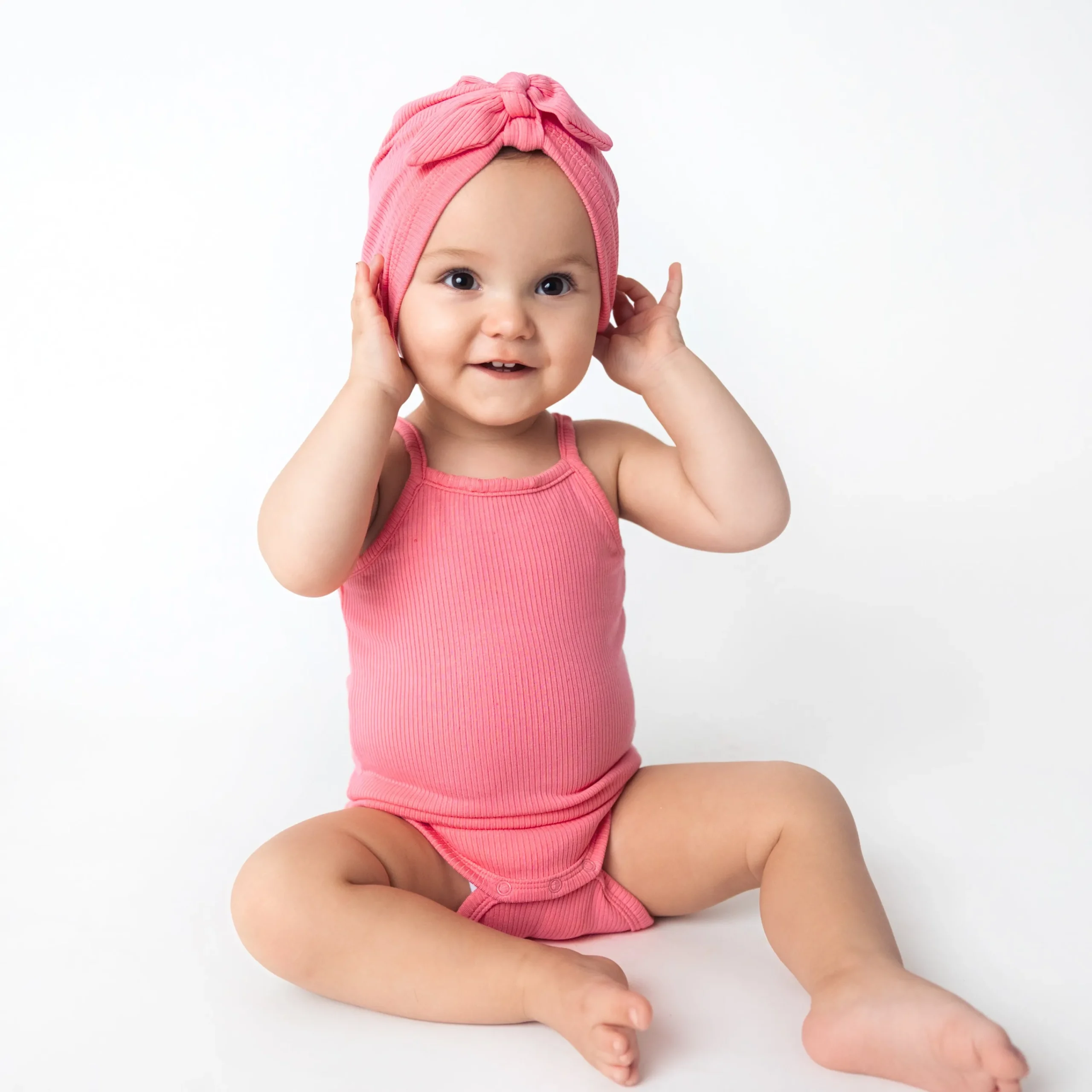 Kyte Baby Ribbed Spaghetti Strap Bodysuit in Guava