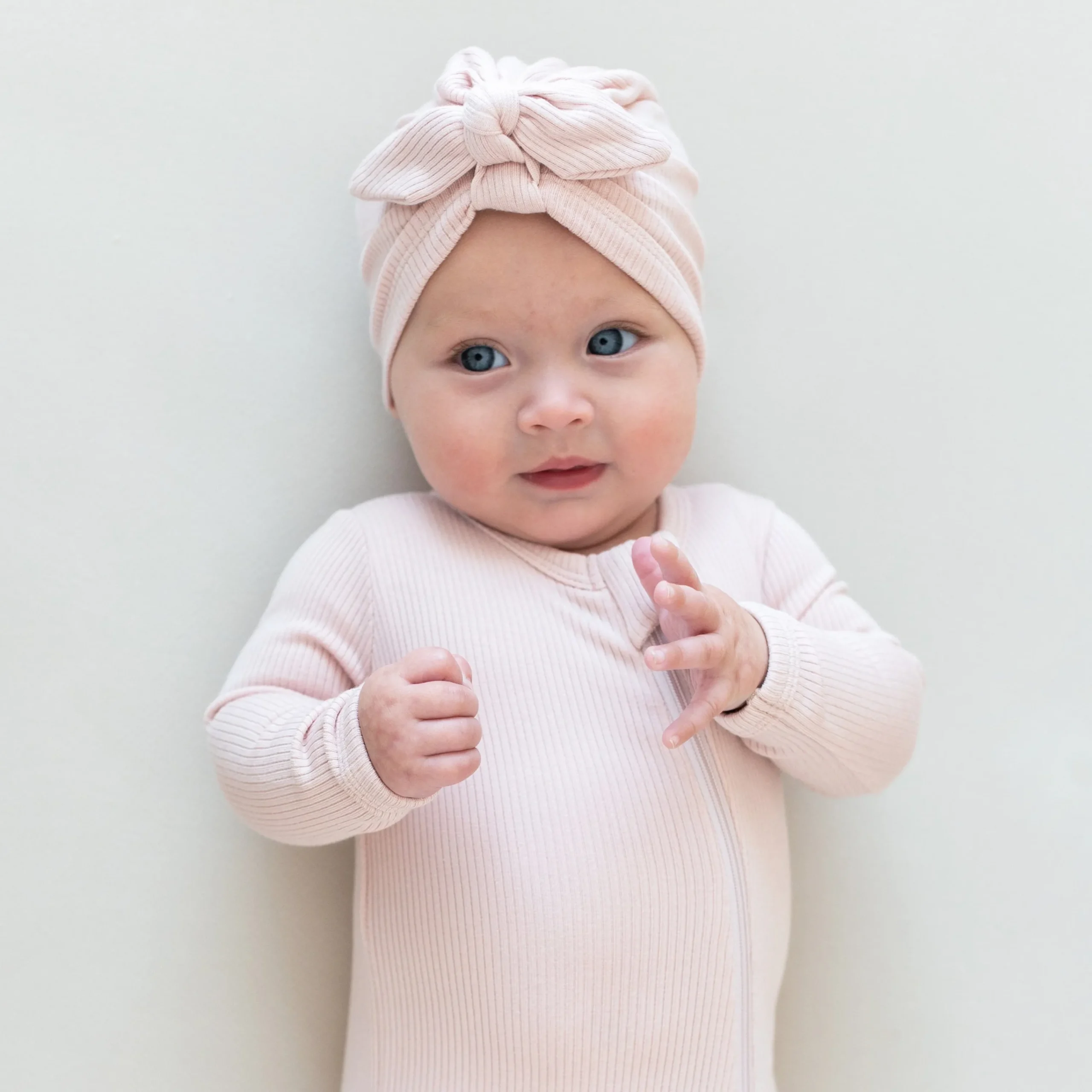 Kyte Baby Ribbed Zipper Footie in Blush Outlet