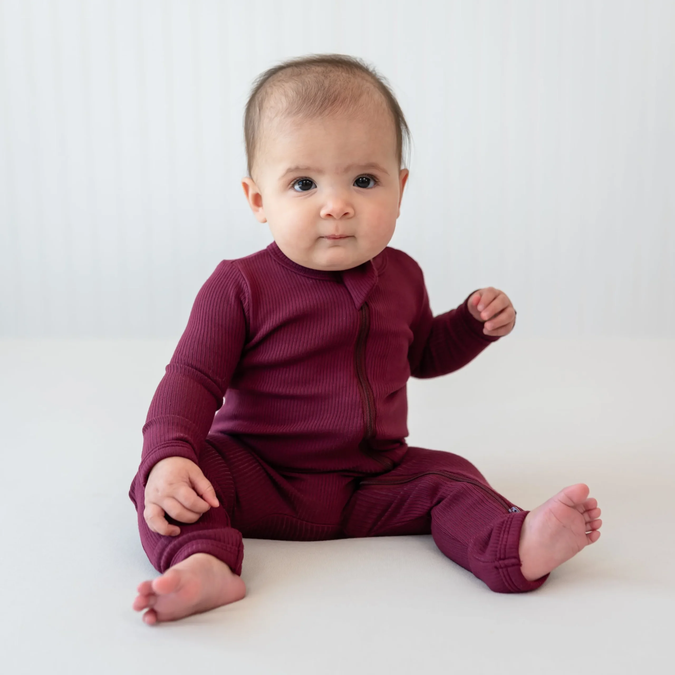 Kyte Baby Ribbed Zipper Romper in Burgundy Sale