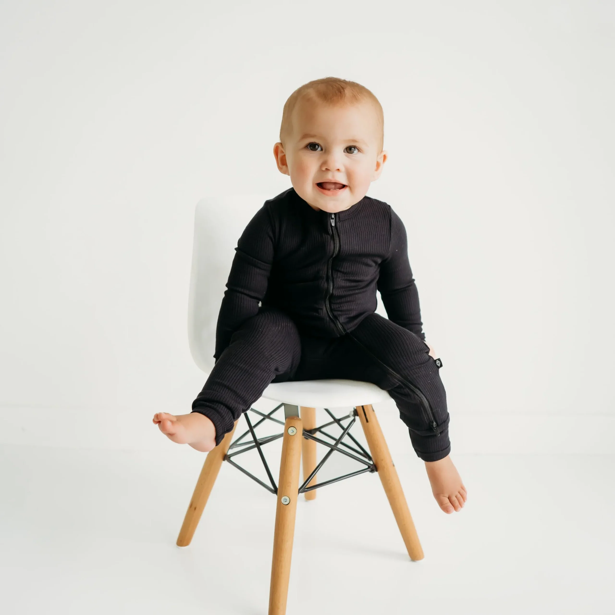 Kyte Baby Ribbed Zipper Romper in Midnight Online